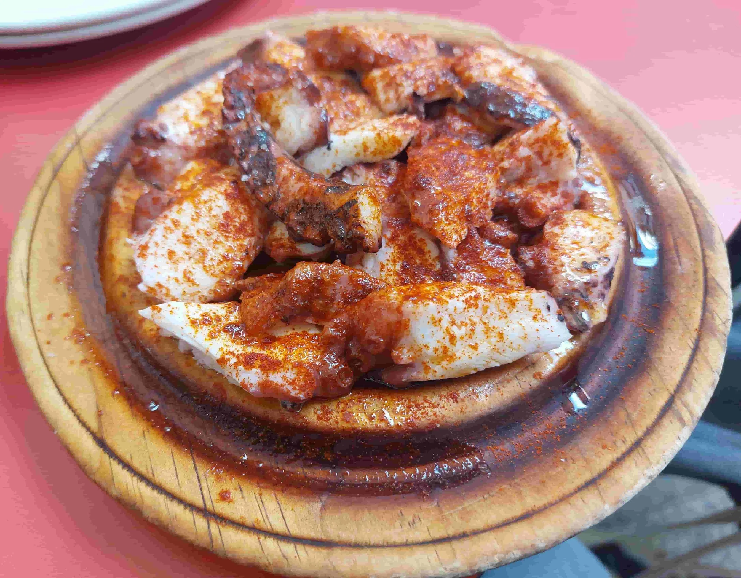 Spanish Pulpo a la Gallega boiled octopus with paprika & olive oil