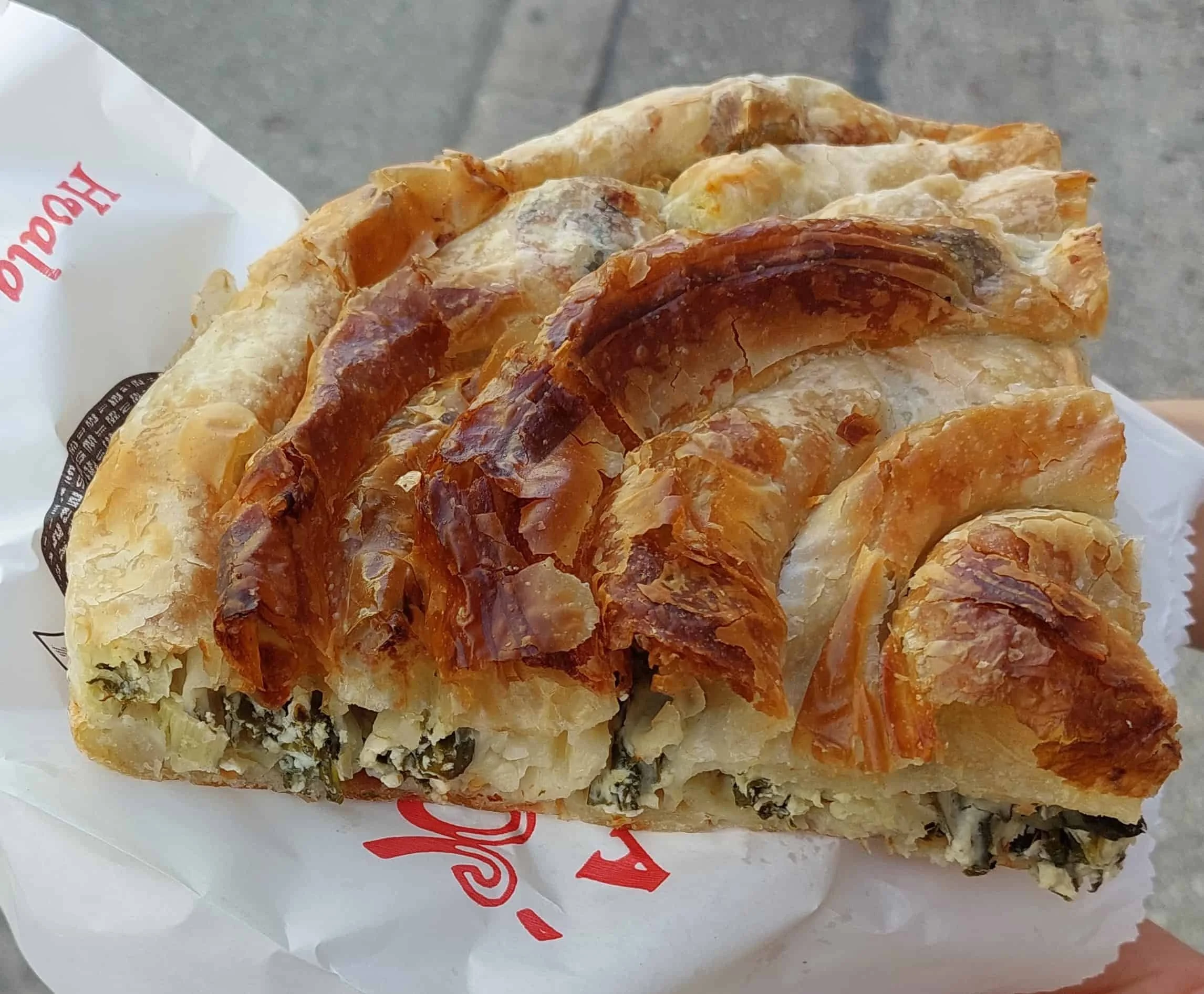 Bosnian Zeljanica slice – flaky phyllo pastry filled with spinach, and cheese