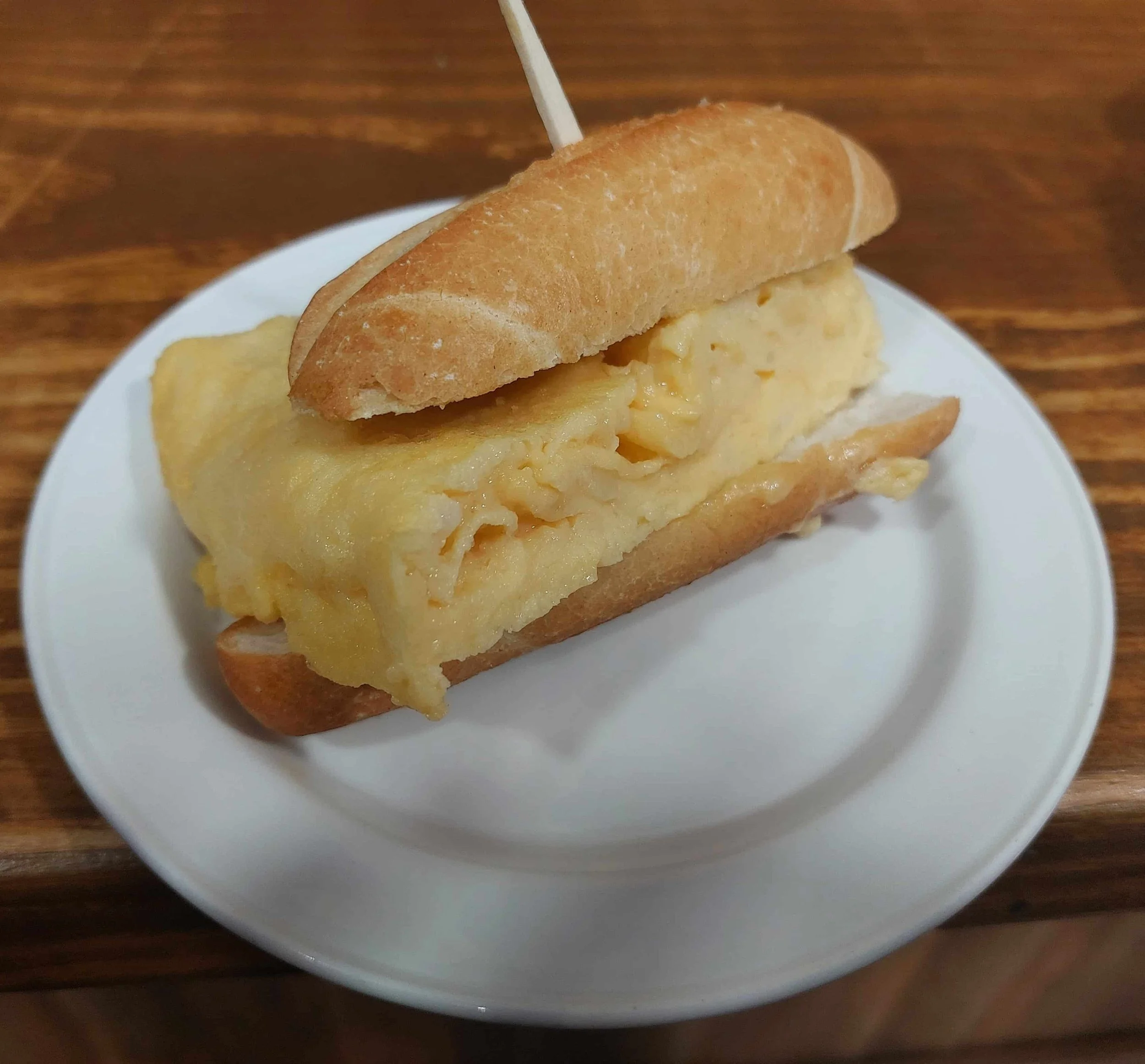 Spanish Tortilla de Patatas pintxo potato omelette served in bread
