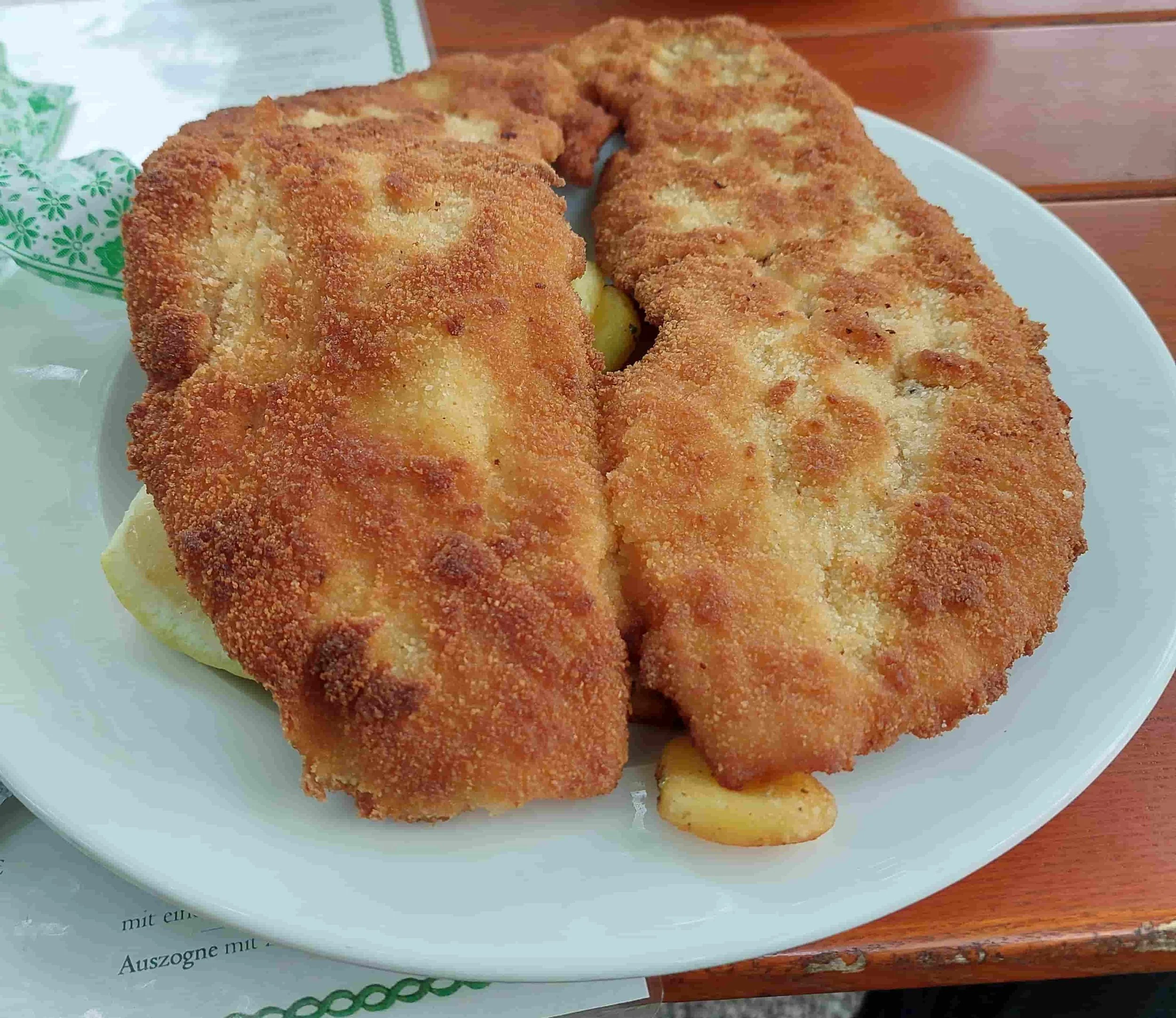 Traditional German schnitzel crispy breaded pork or veal cutlet