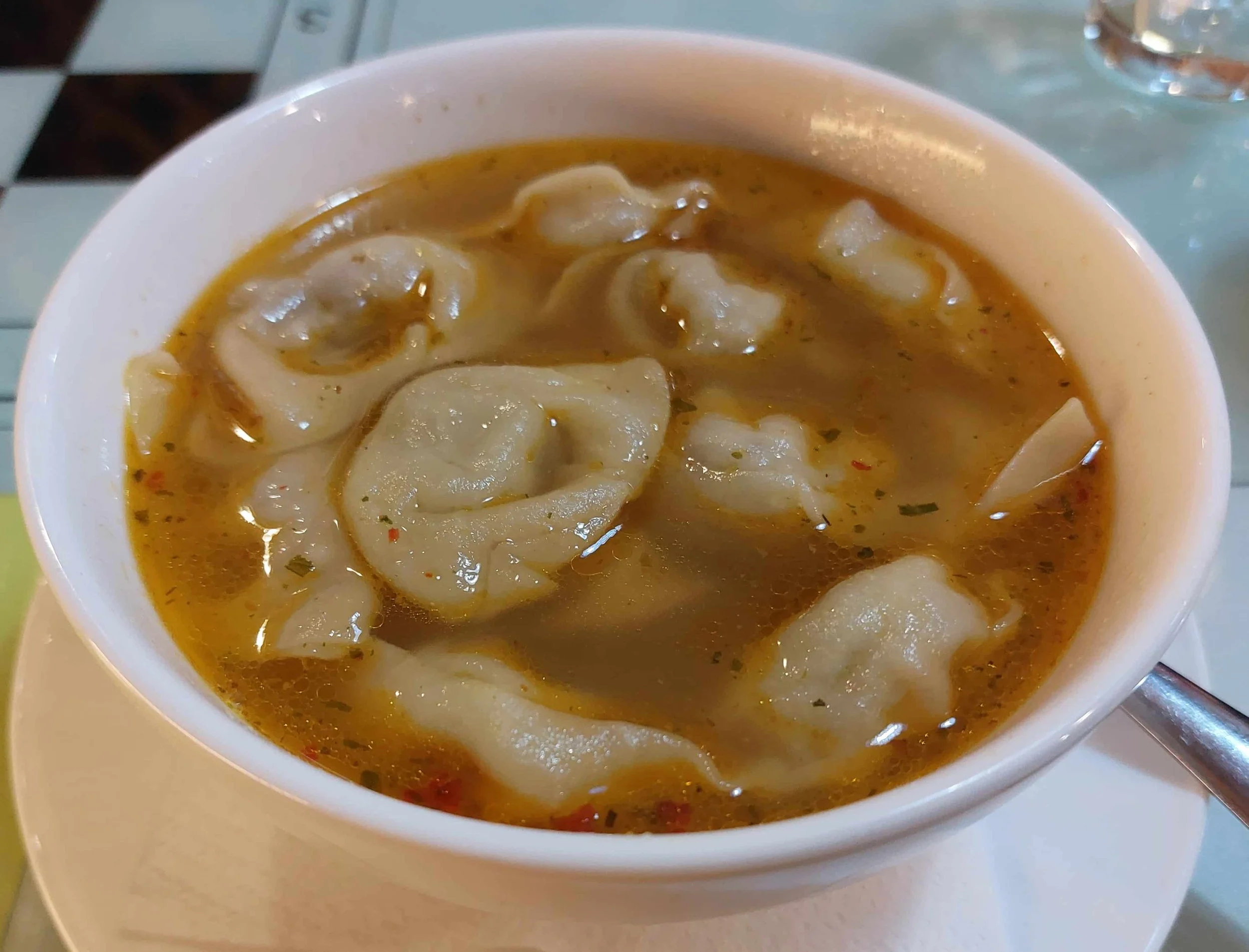 Uzbek chuchvara small dumplings filled with minced meat and onions served in broth