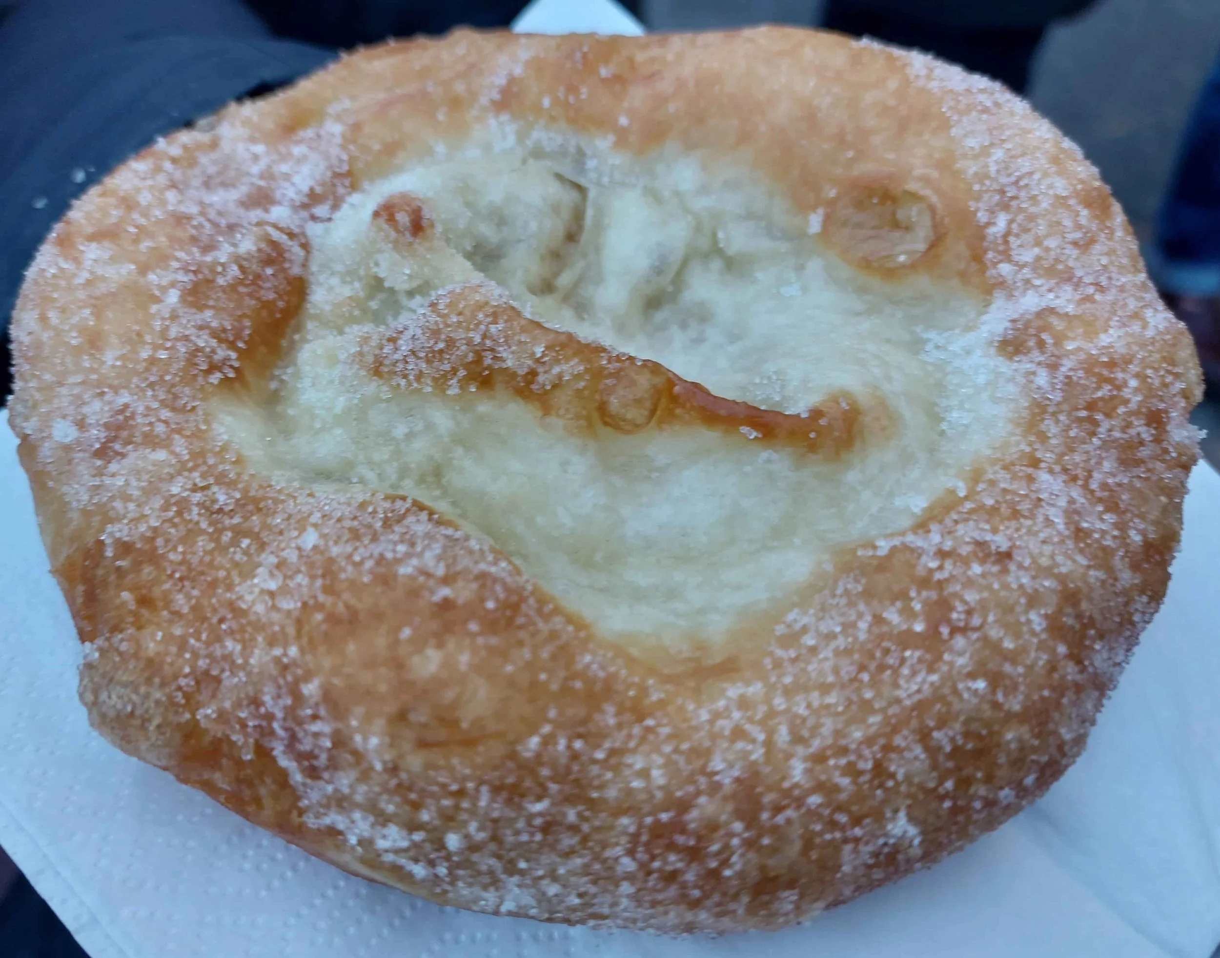 Ausgezogene Bavarian fried pastry dusted with icing sugar