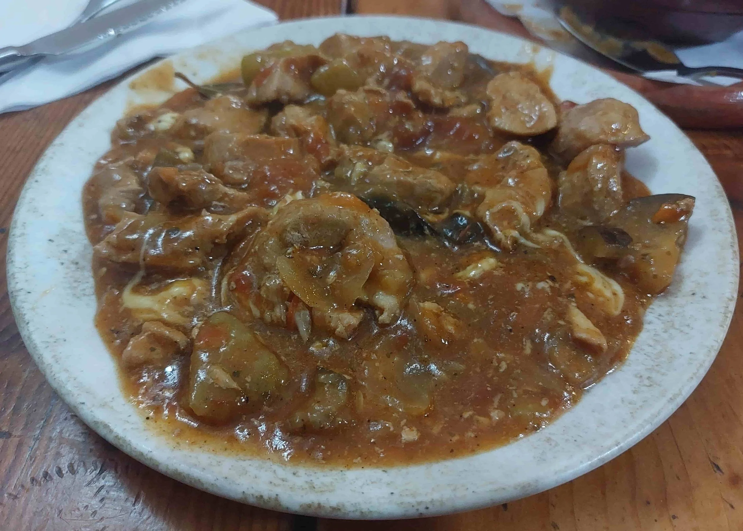 North Macedonian Turli Tava mixed vegetables and meat baked in traditional style on a plate