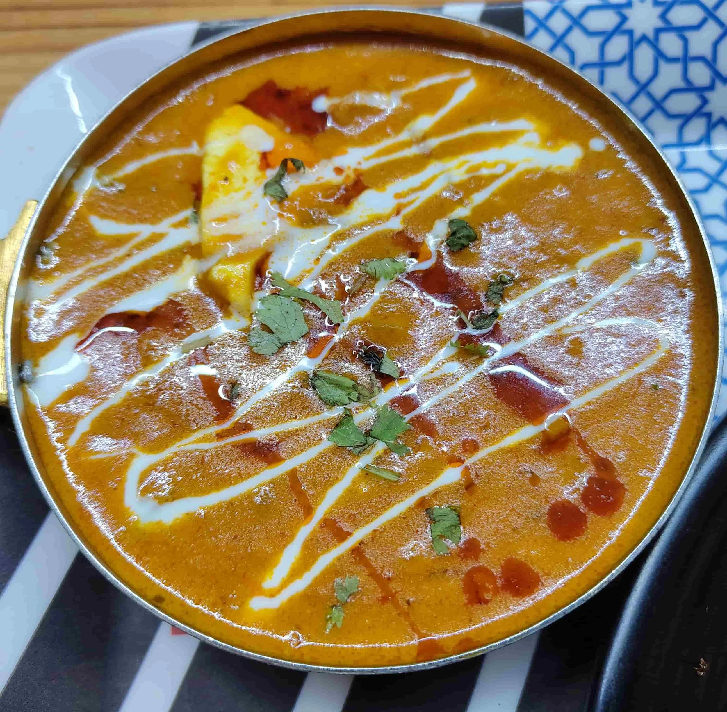 Paneer lababdar – Indian cottage cheese curry in a tomato and cream sauce, finished with fresh cream and coriander