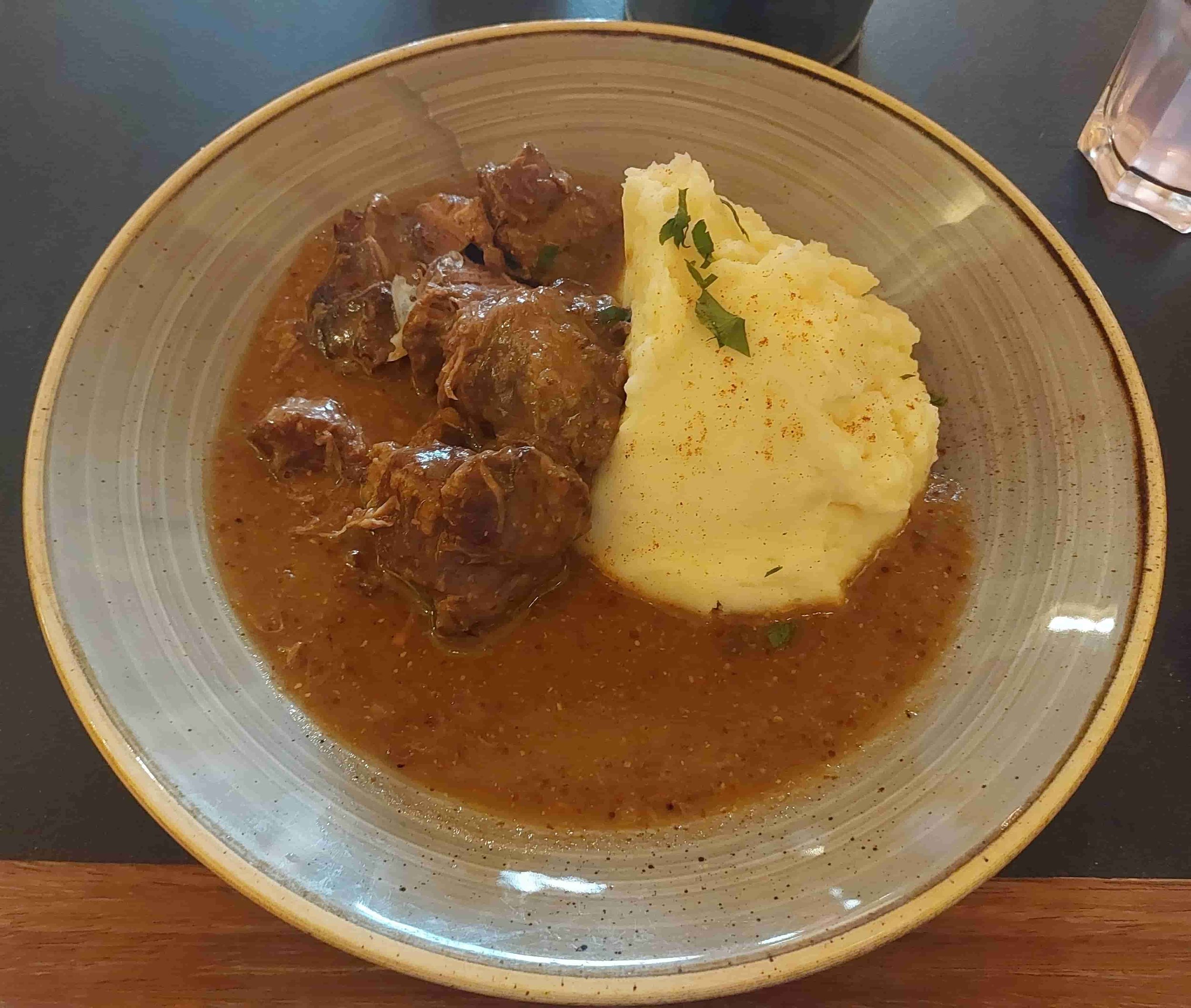 Belgian Carbonnades Flamande beef stew in beer sauce served with mashed potatoes