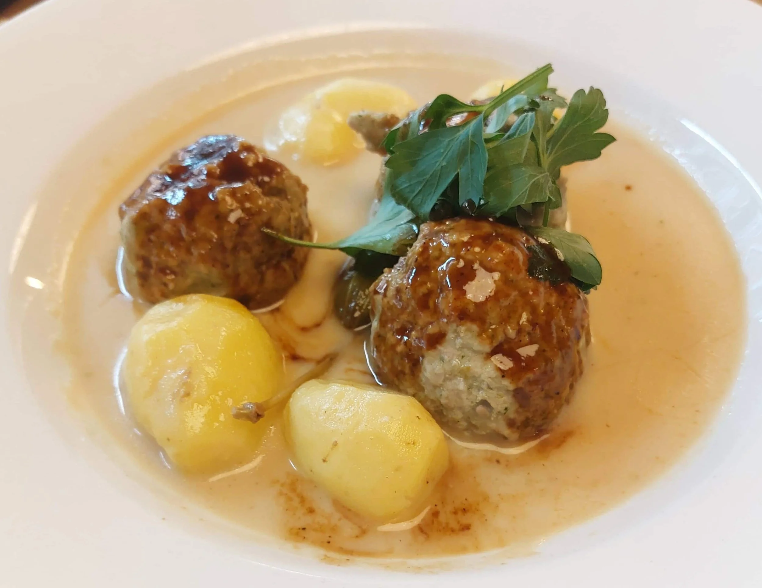 German Königsberger Klopse meatballs in creamy white sauce with capers traditional dish