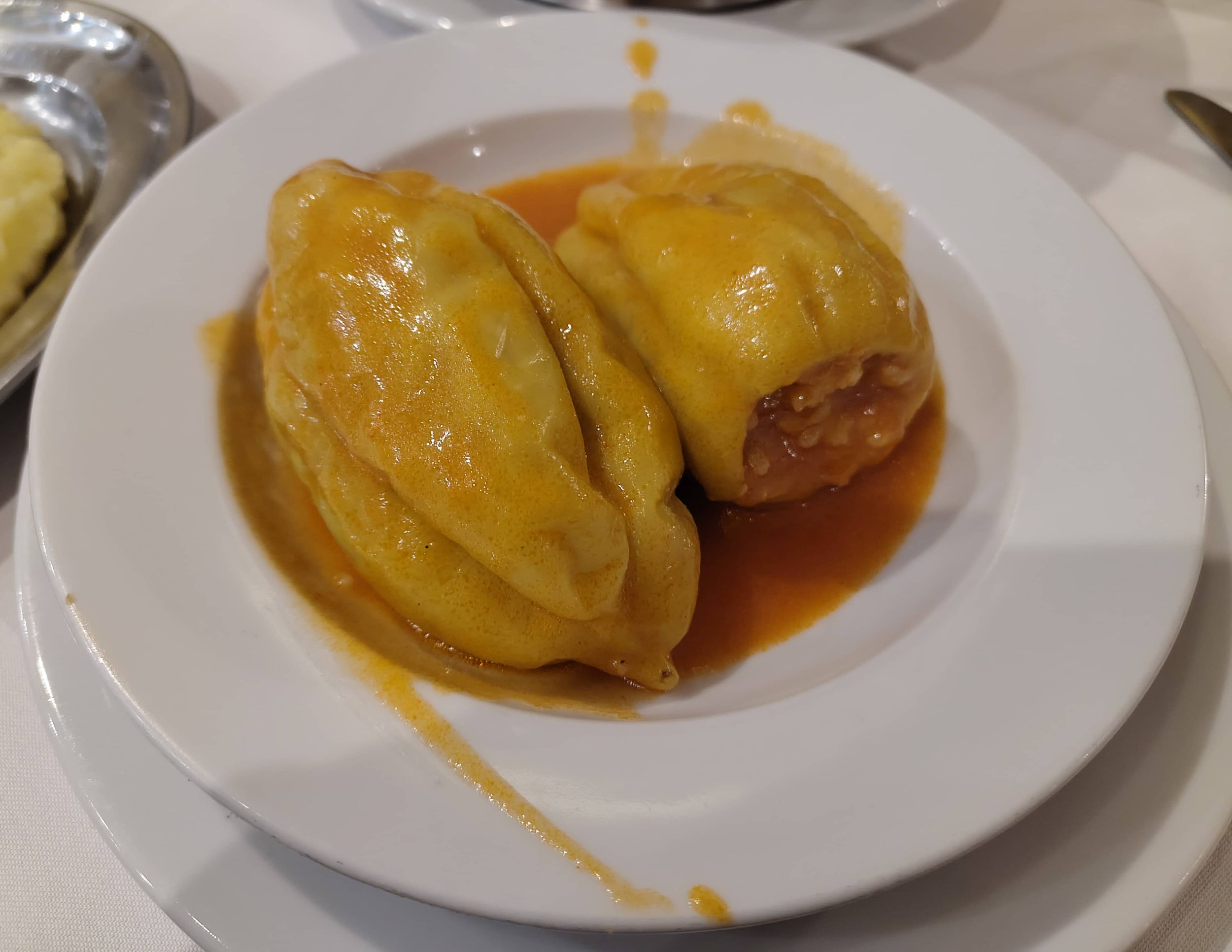 Punjene paprike Croatian stuffed peppers served in a tomato based sauce