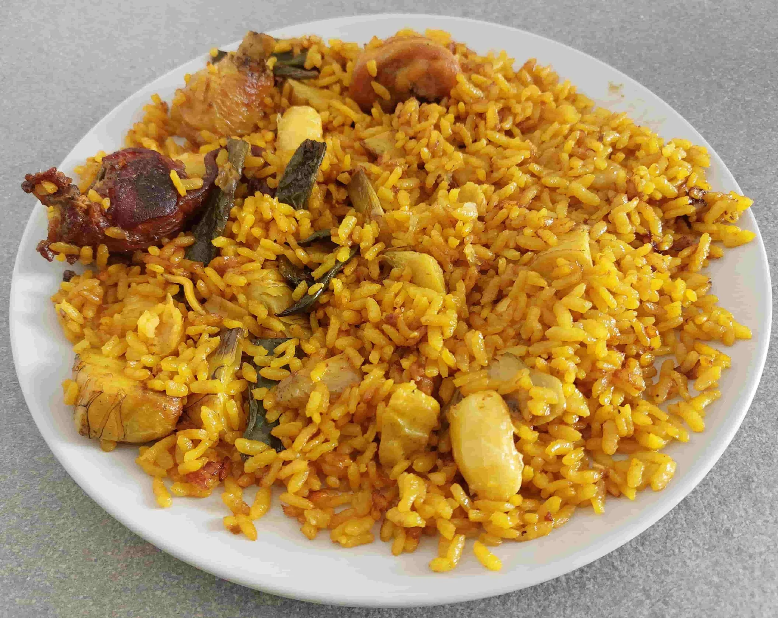 Spanish Valencian Paella traditional saffron rice with chicken, rabbit, and vegetables
