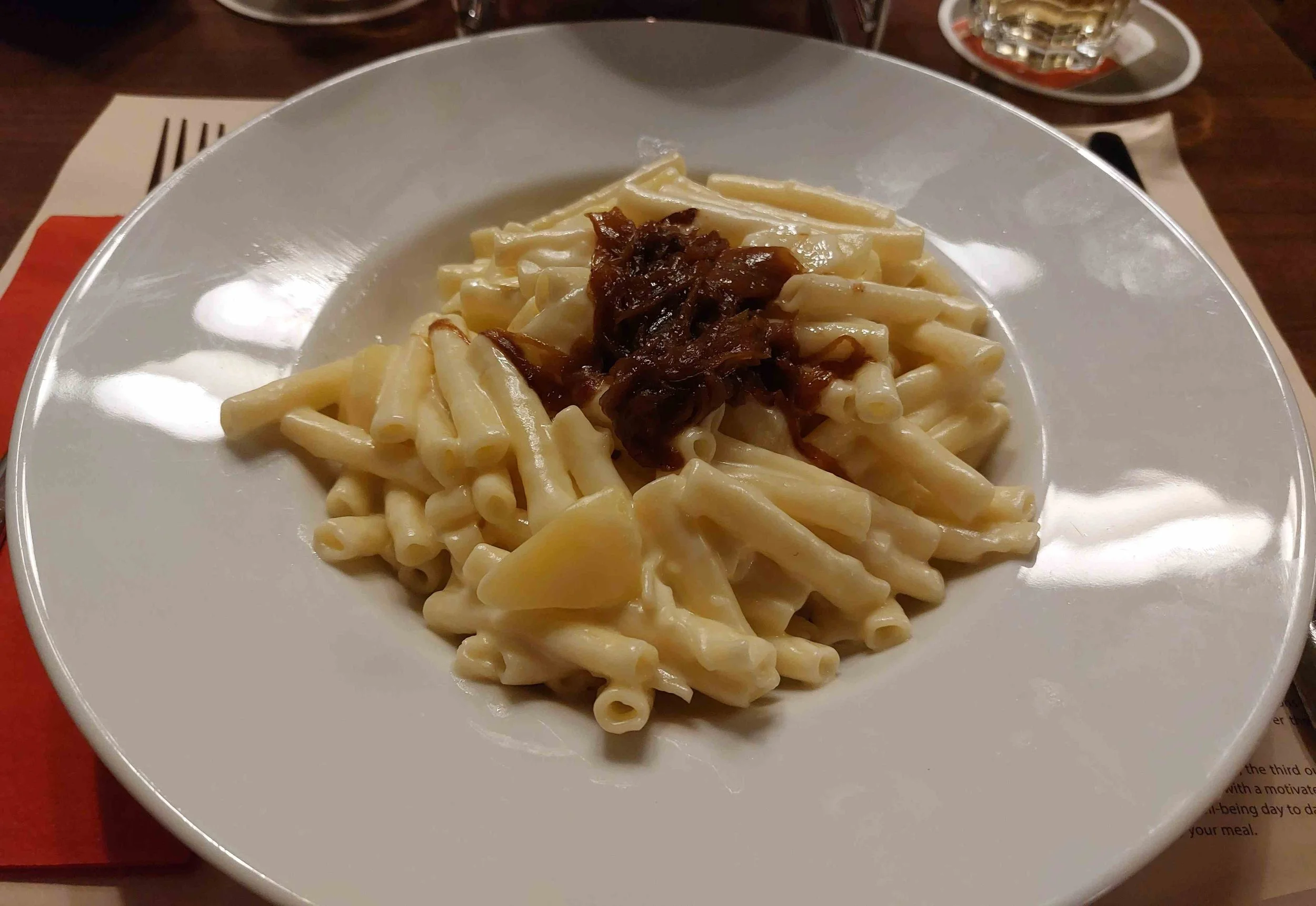 Älplermagronen – traditional Swiss alpine pasta with potatoes, cheese, and cream