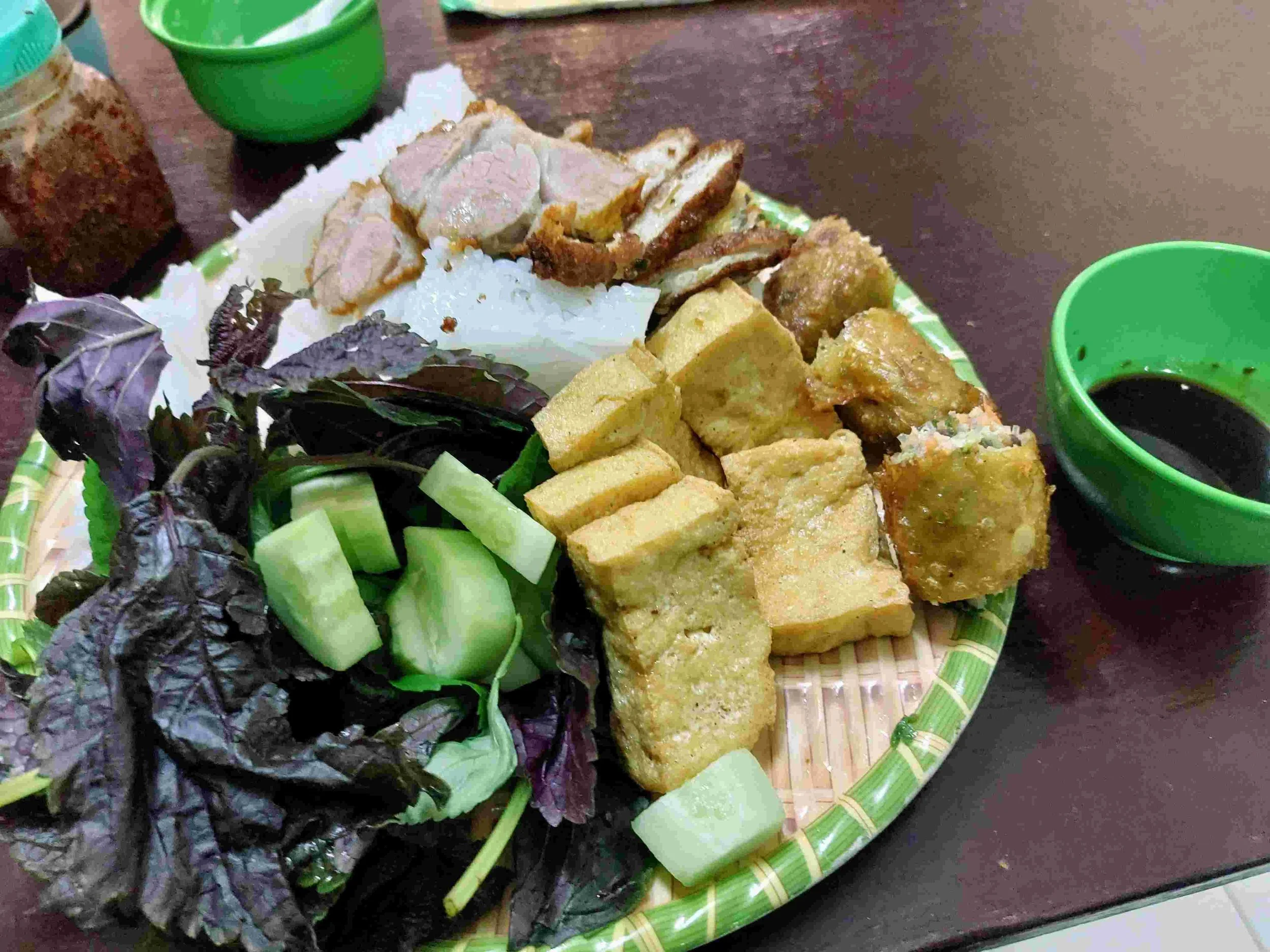 Bún Đậu Mắm Tôm – Vietnamese rice noodles served with fried spring rolls (chả giò), tofu, herbs, and fermented shrimp paste dipping sauce