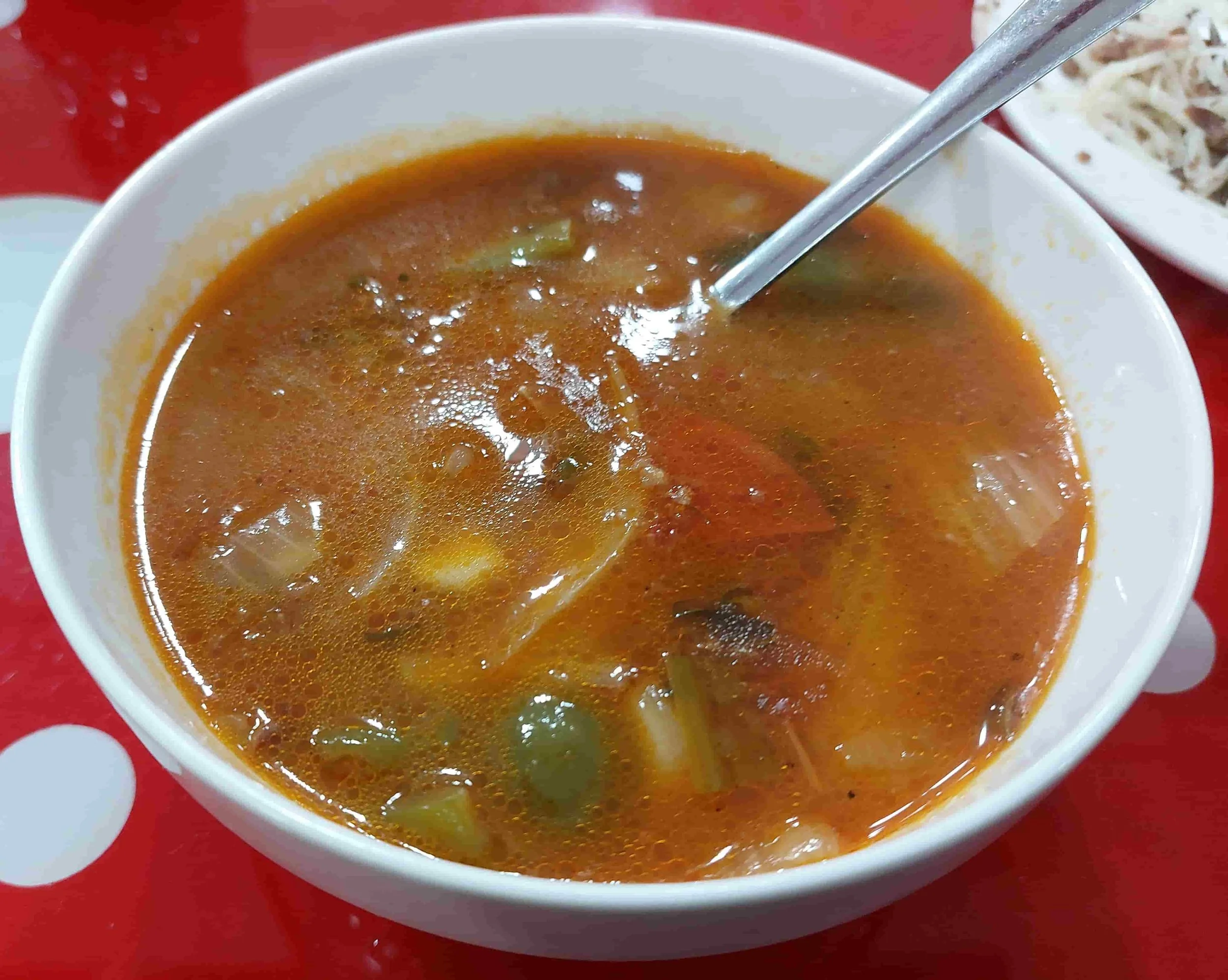 Uzbek Mampar soup with boiled dough dumplings and meat in savory broth