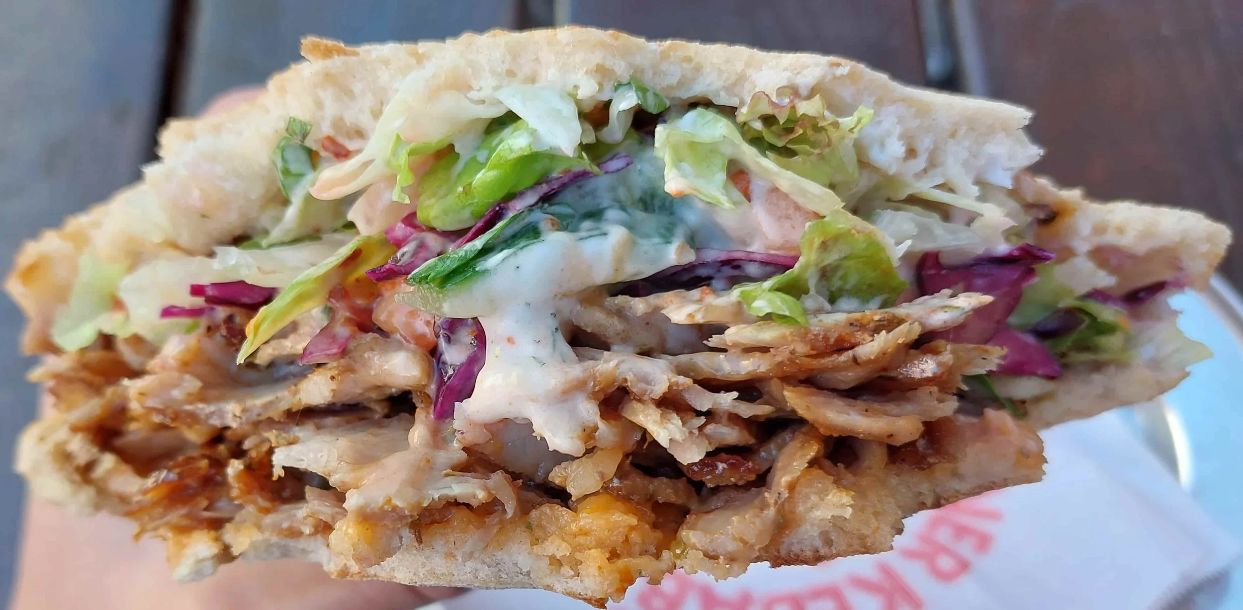 German döner dürüm wrap grilled meat with salad and sauce