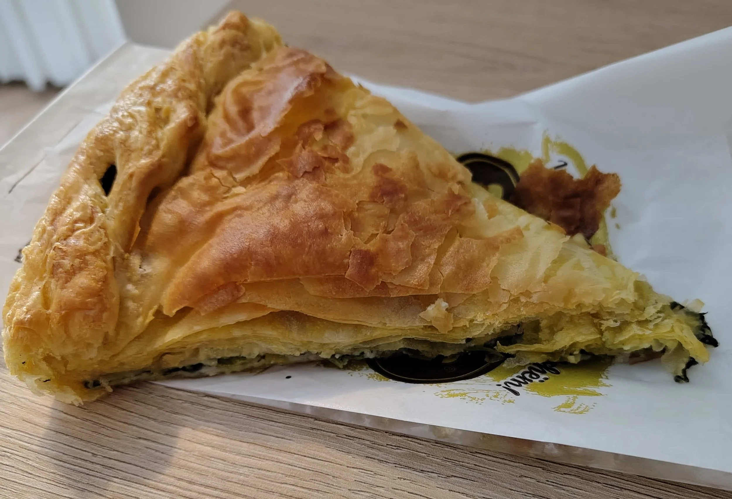 Albanian byrek, flaky filo pastry filled with spinach