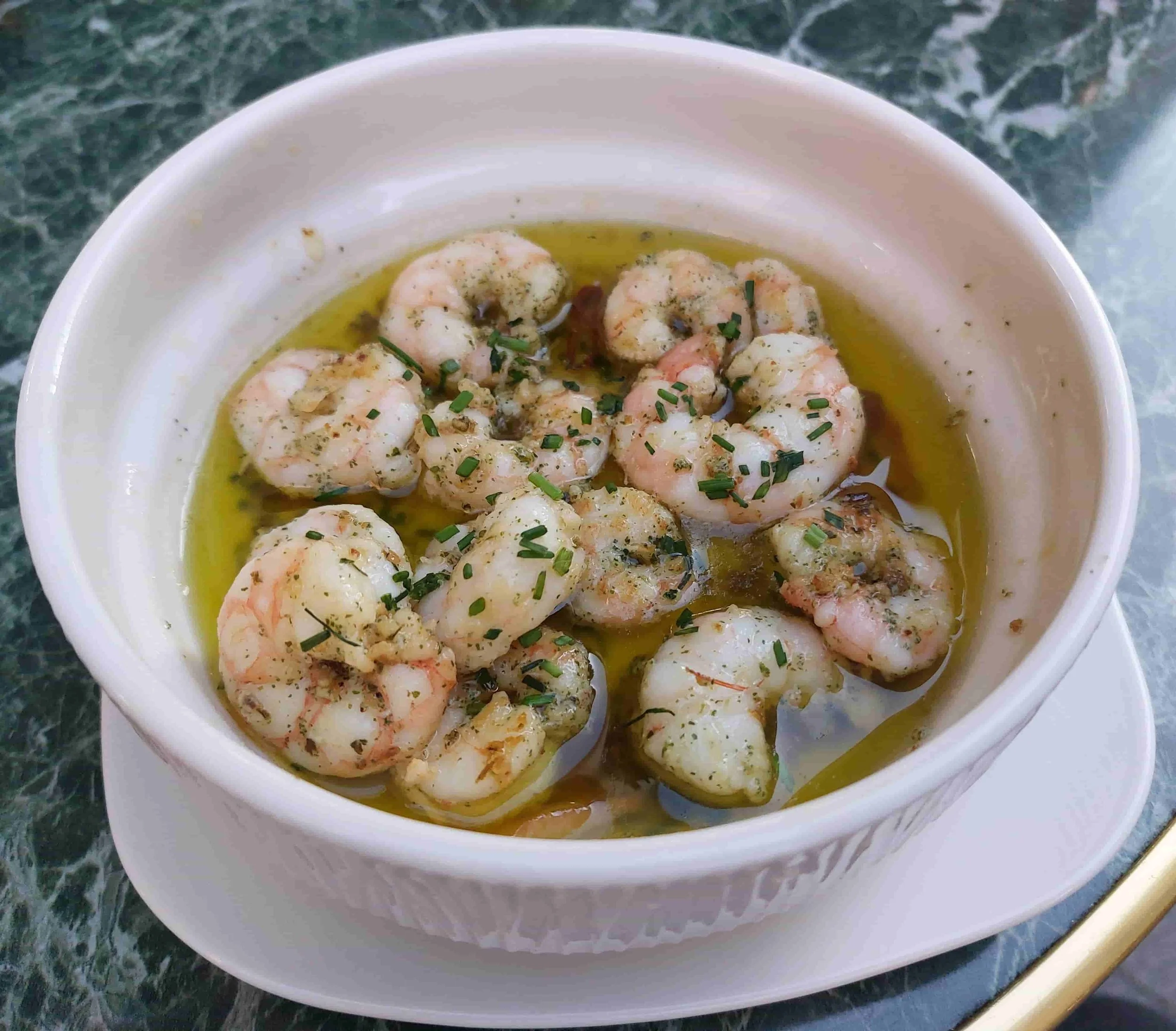 Spanish Gambas al Ajillo sautéed prawns with garlic and olive oil