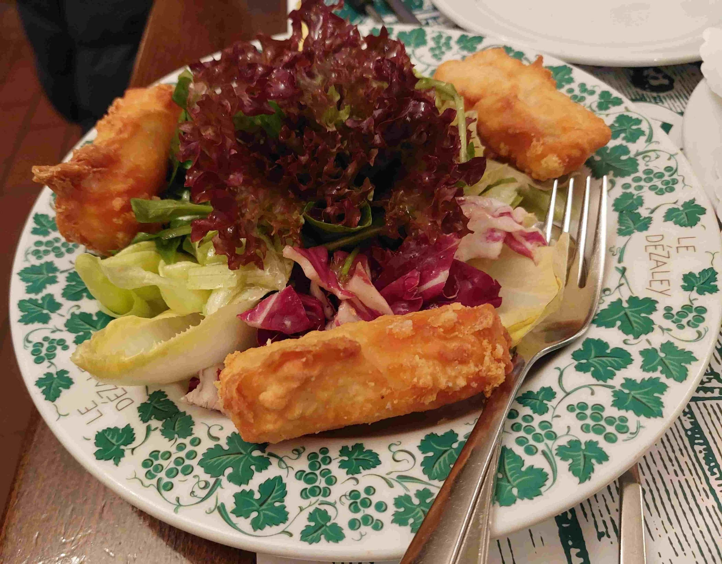 Malakoff – Swiss deep-fried cheese fritters served with salad