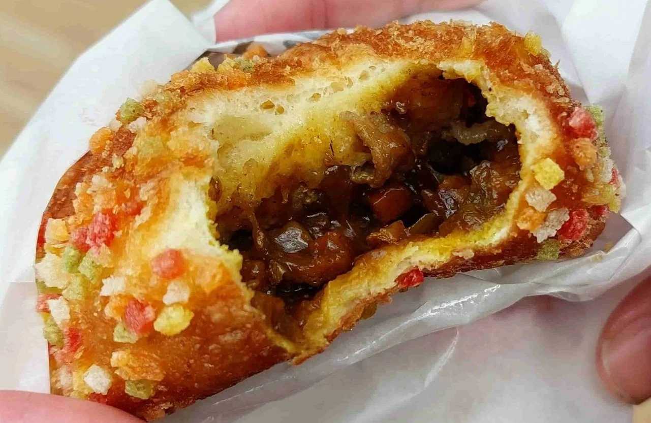 Japanese curry bread (kare pan) – deep-fried bread roll filled with savoury Japanese curry, golden and crispy on the outside.