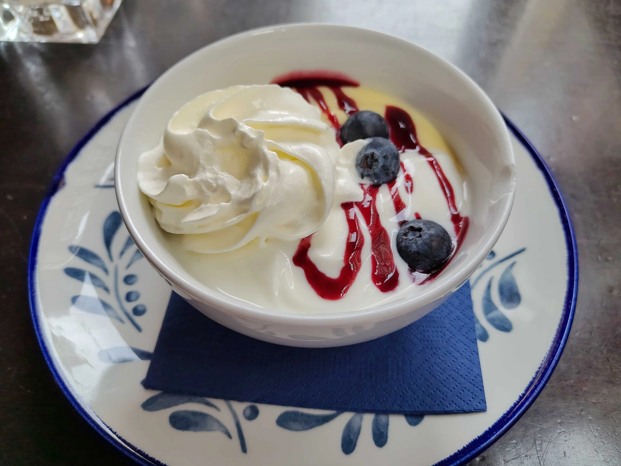 Dutch vlaflip – layered vanilla custard, yoghurt, blueberries, and fruit syrup dessert
