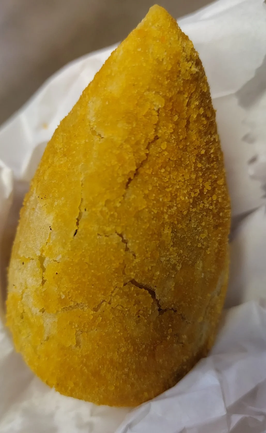 Traditional Brazilian coxinha, a tear-shaped fried snack filled with shredded chicken