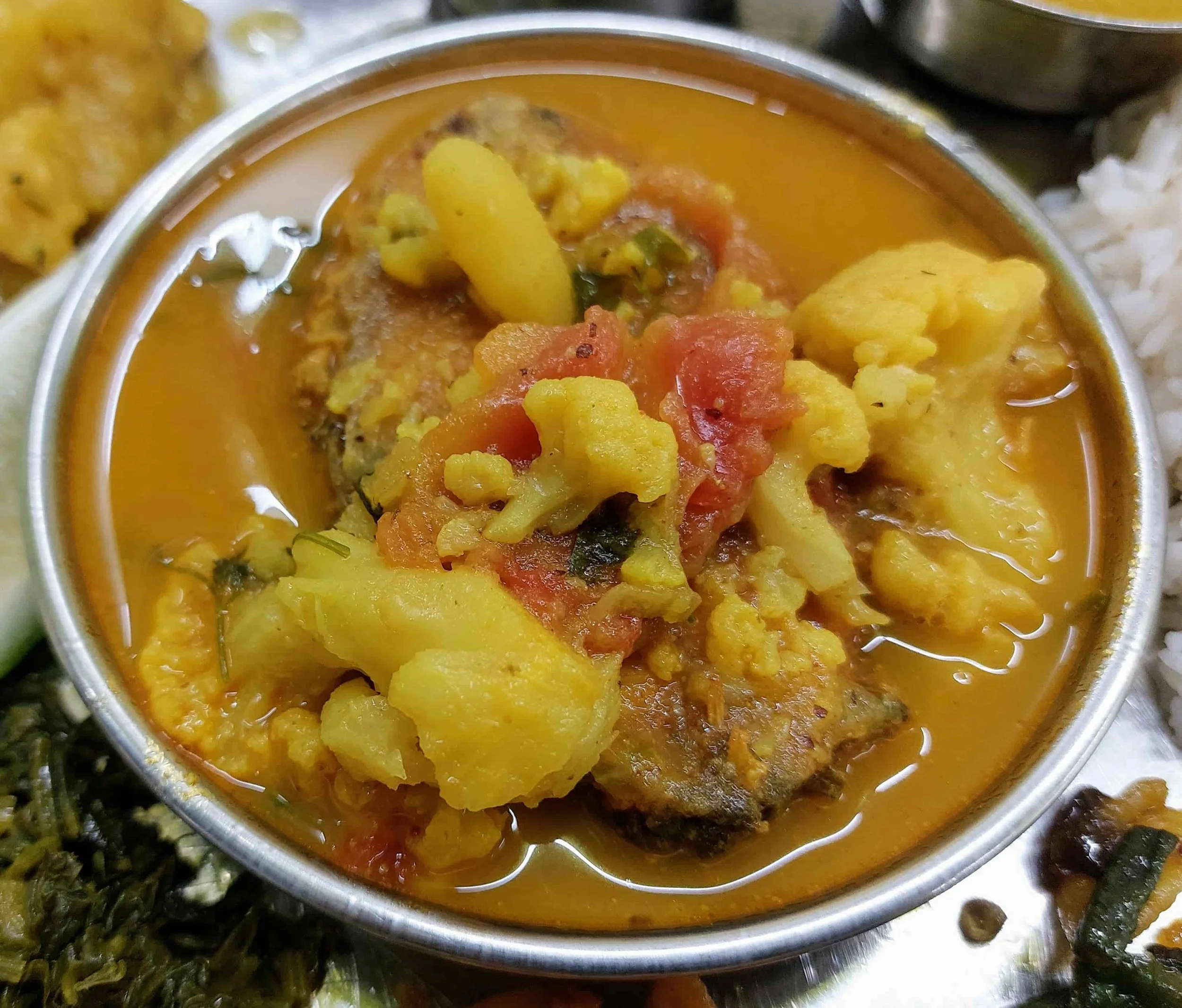 Tenga – traditional Assamese sour fish curry with cauliflower and tomatoes
