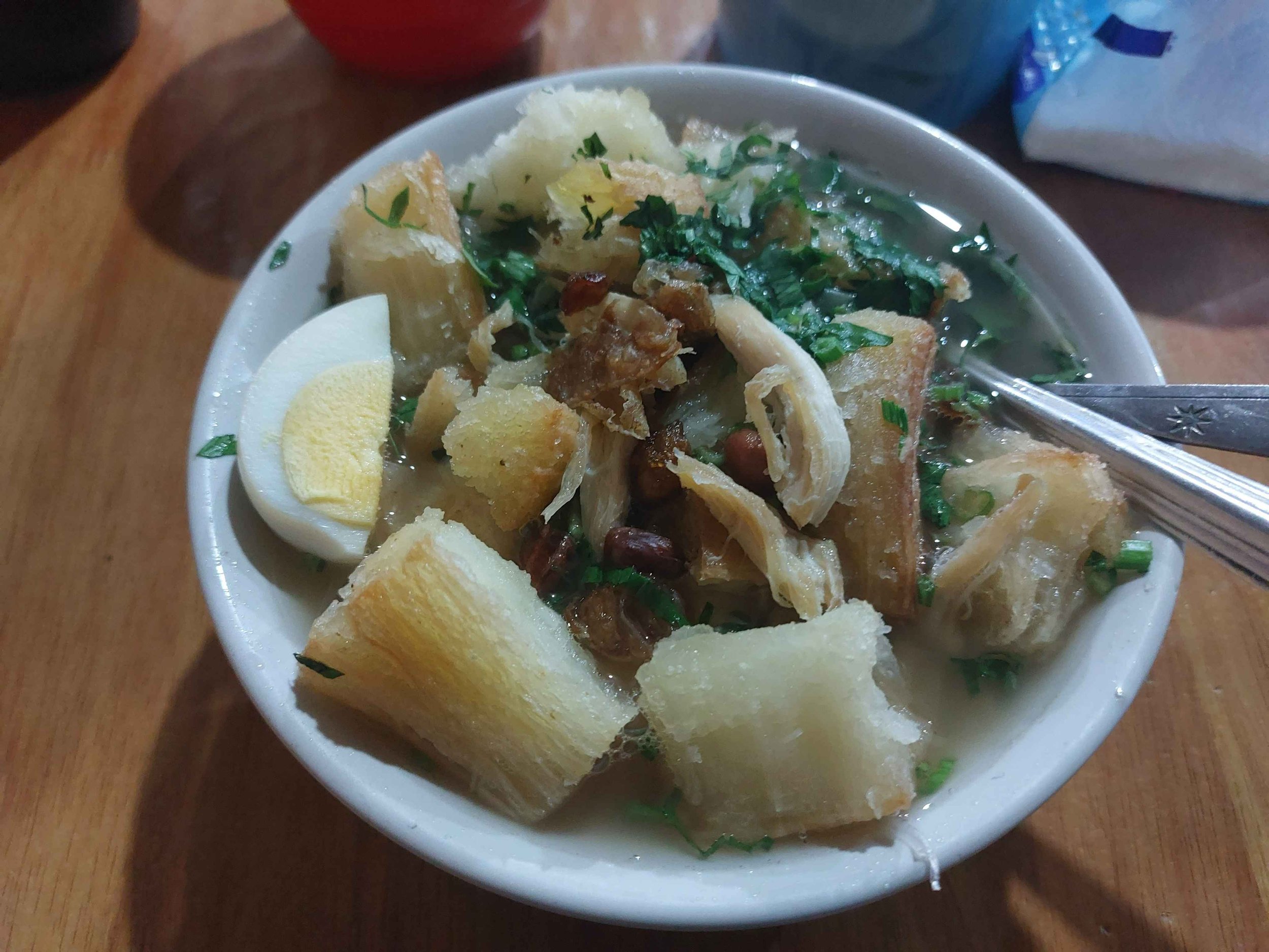Sop ubi – Makassar-style cassava soup with shredded chicken, vermicelli noodles, boiled egg in a savoury broth