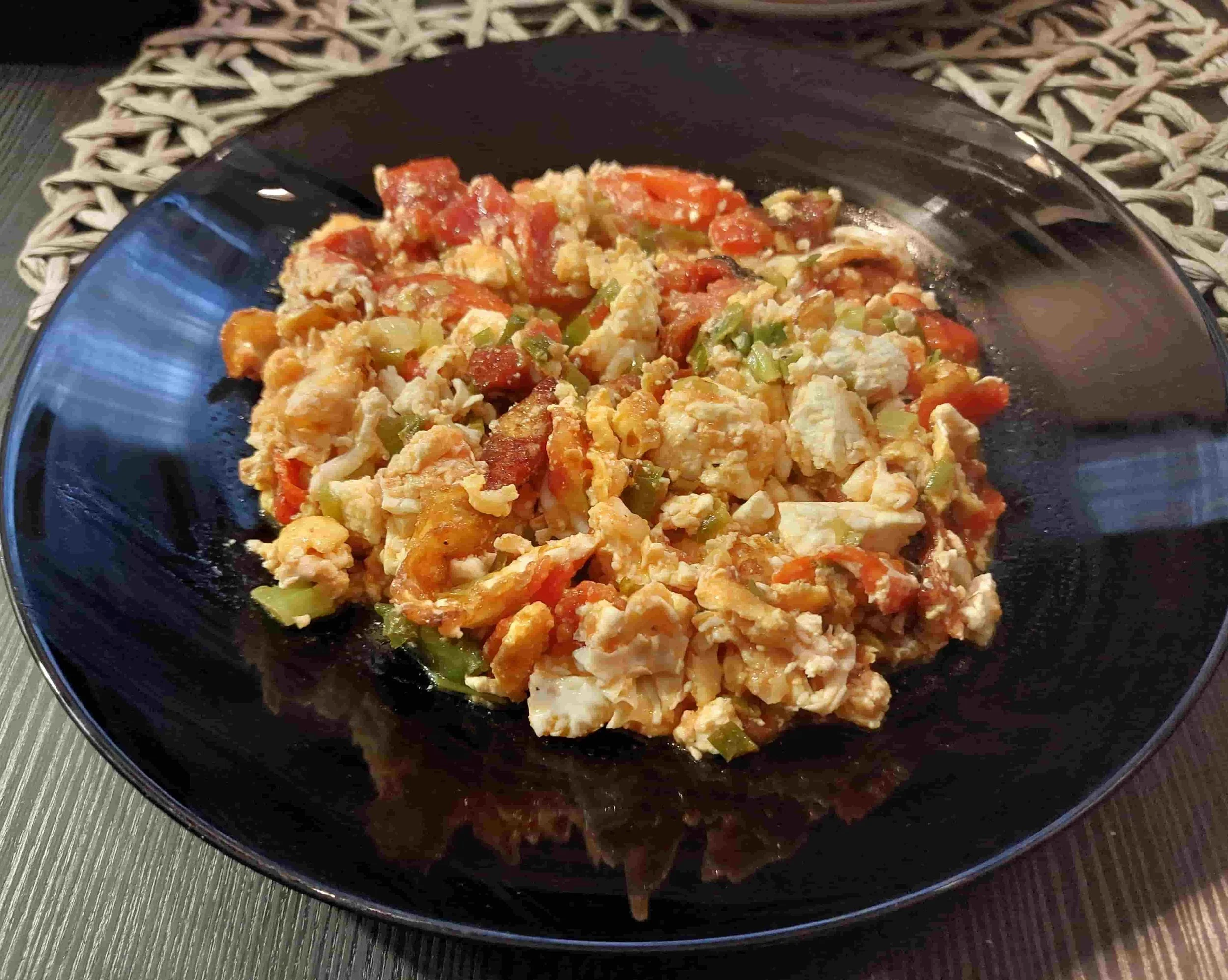 Bulgarian mish-mash with eggs, peppers, tomatoes, and white cheese