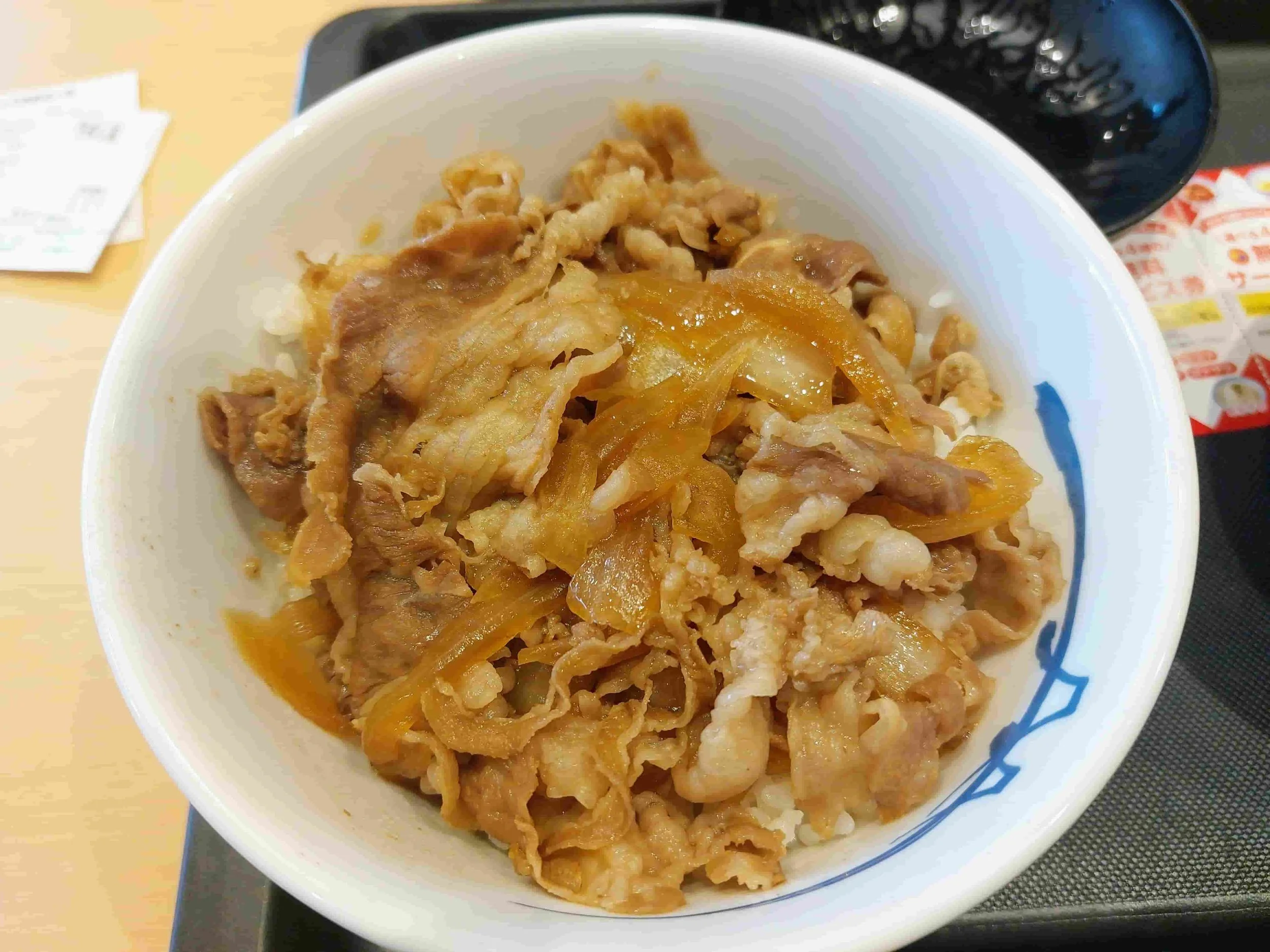 Japanese gyudon – thinly sliced beef simmered with onions served over steamed rice.