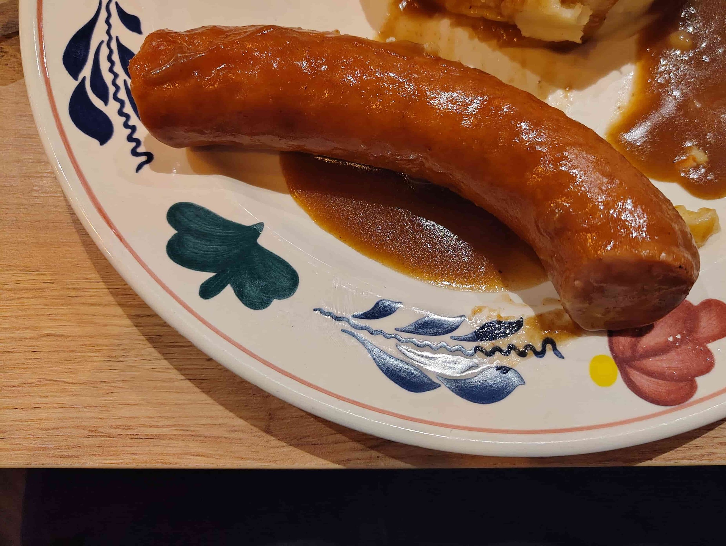 Dutch rookworst smoked sausage served with gravy