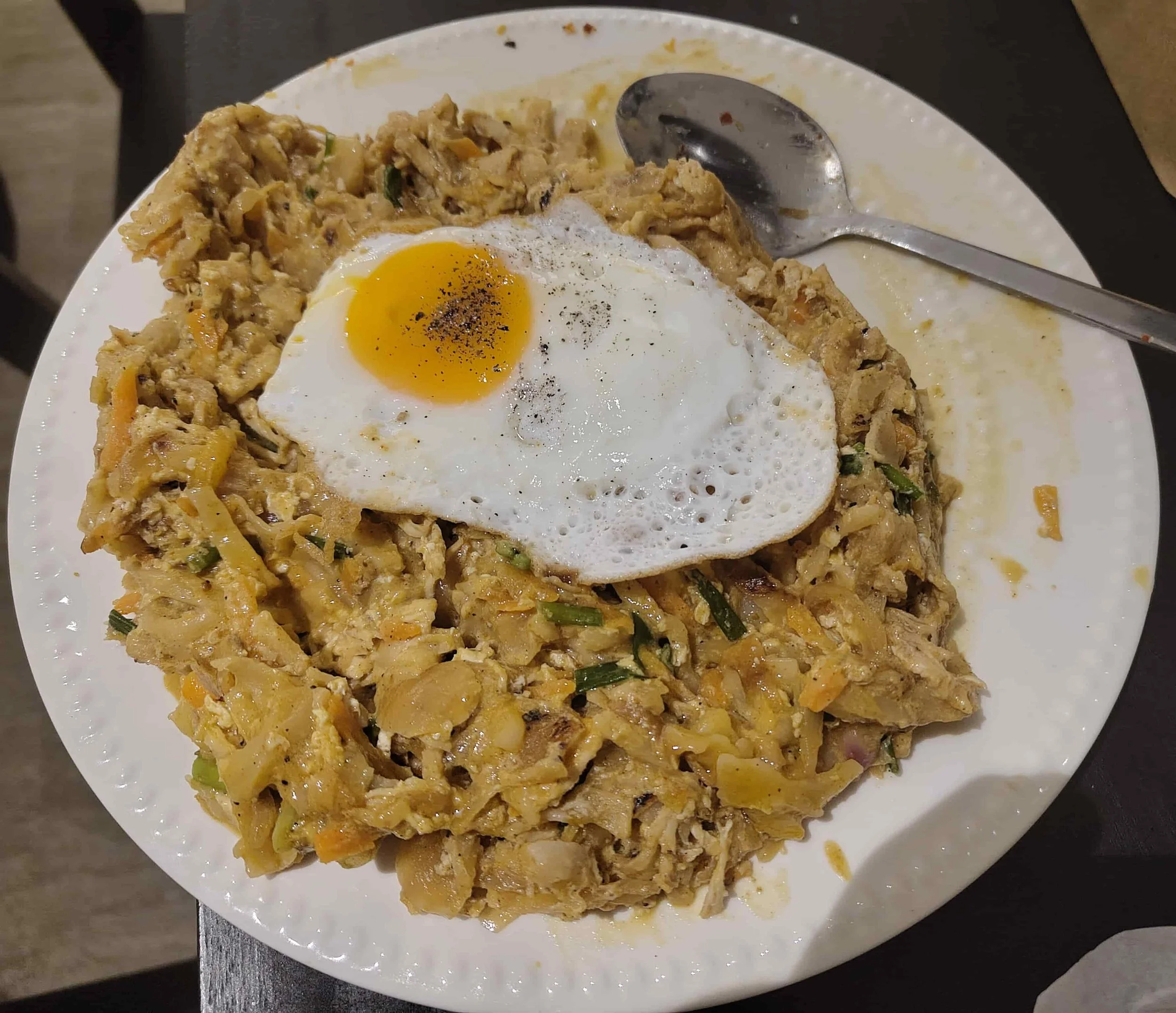 Sri Lankan kottu roti topped with a fried egg