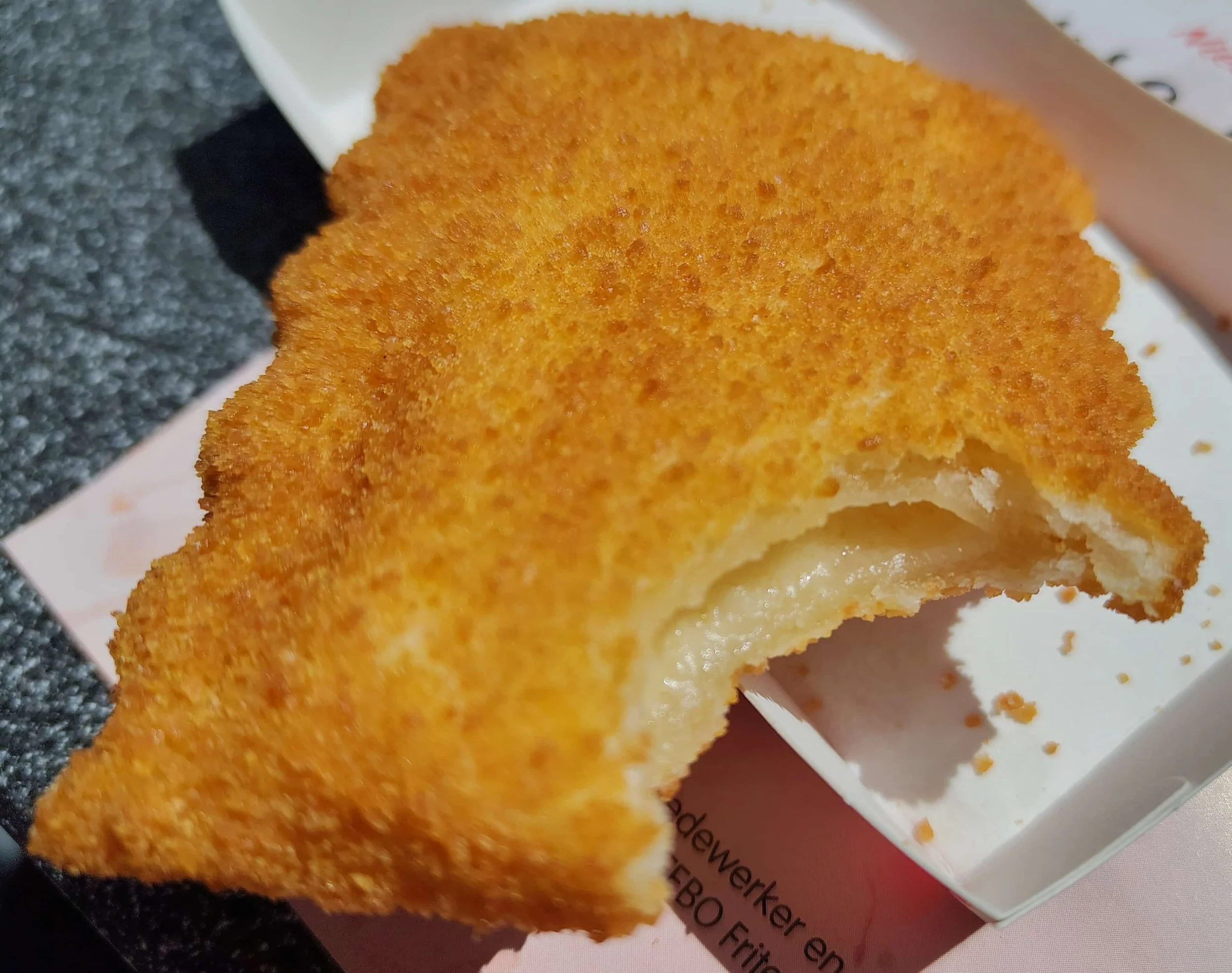 Dutch kaassoufflé – crispy deep fried pastry filled with melted cheese