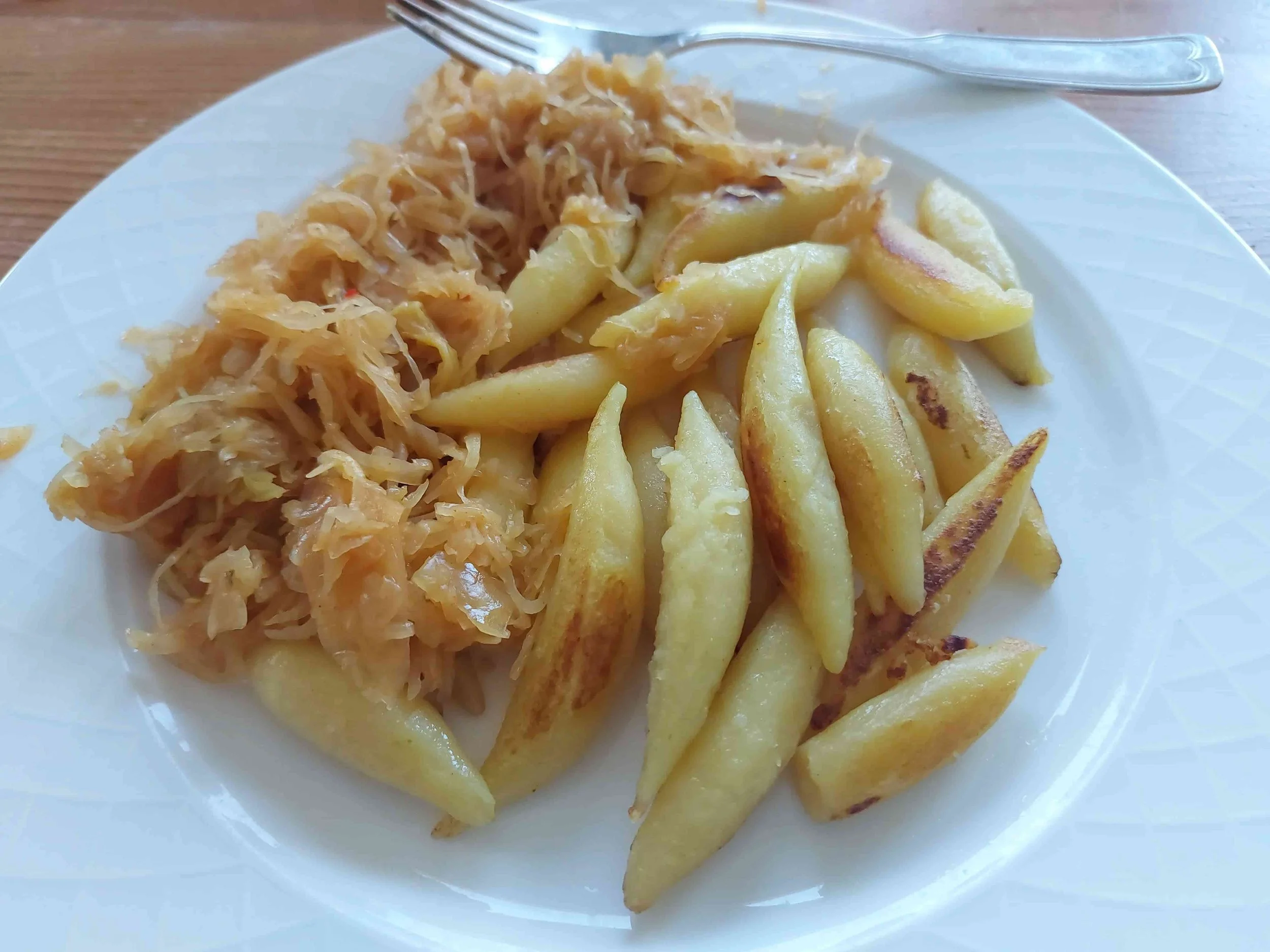 German Schupfnudel potato noodles pan-fried with sauerkraut traditional German dish