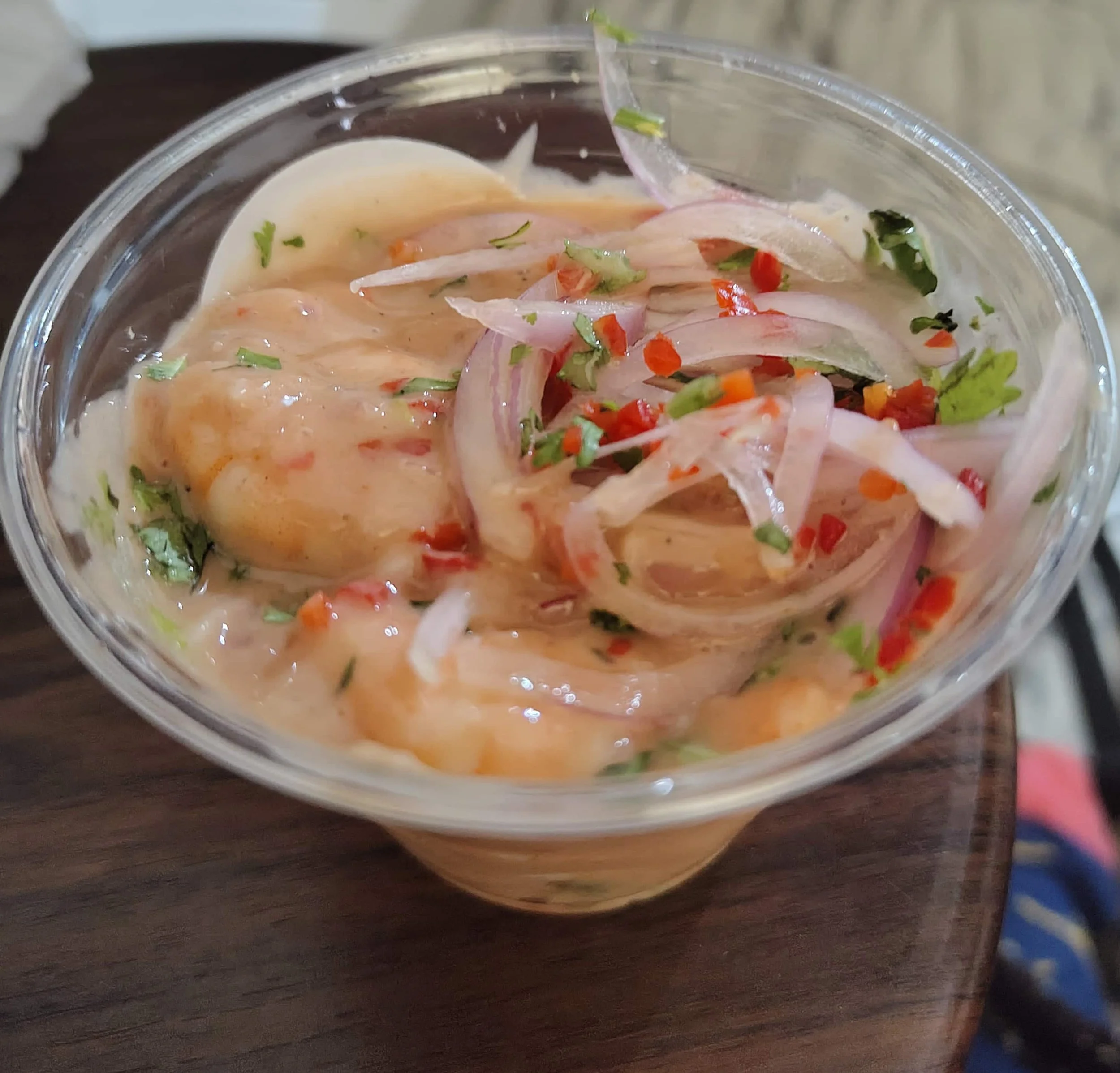 Colombian prawn ceviche – prawns served in a creamy citrus sauce with onion and coriander