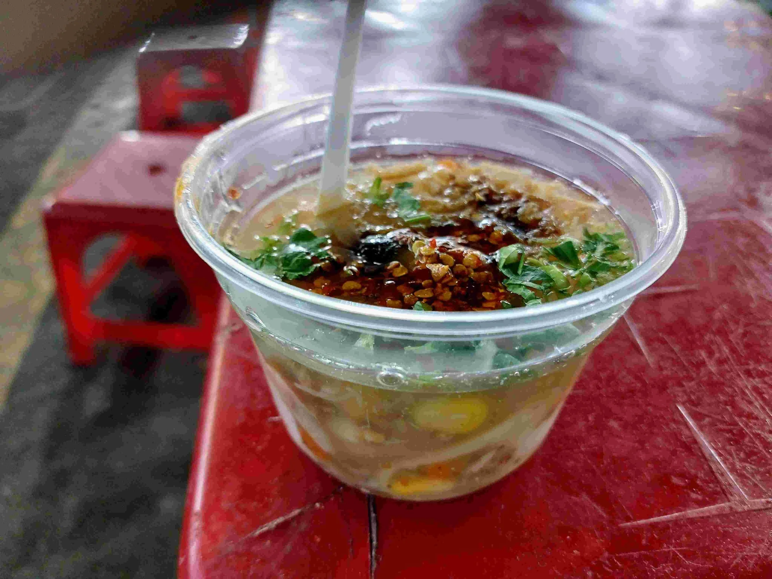 Cup of Súp Bắp Cua – Vietnamese creamy crab and corn soup served hot