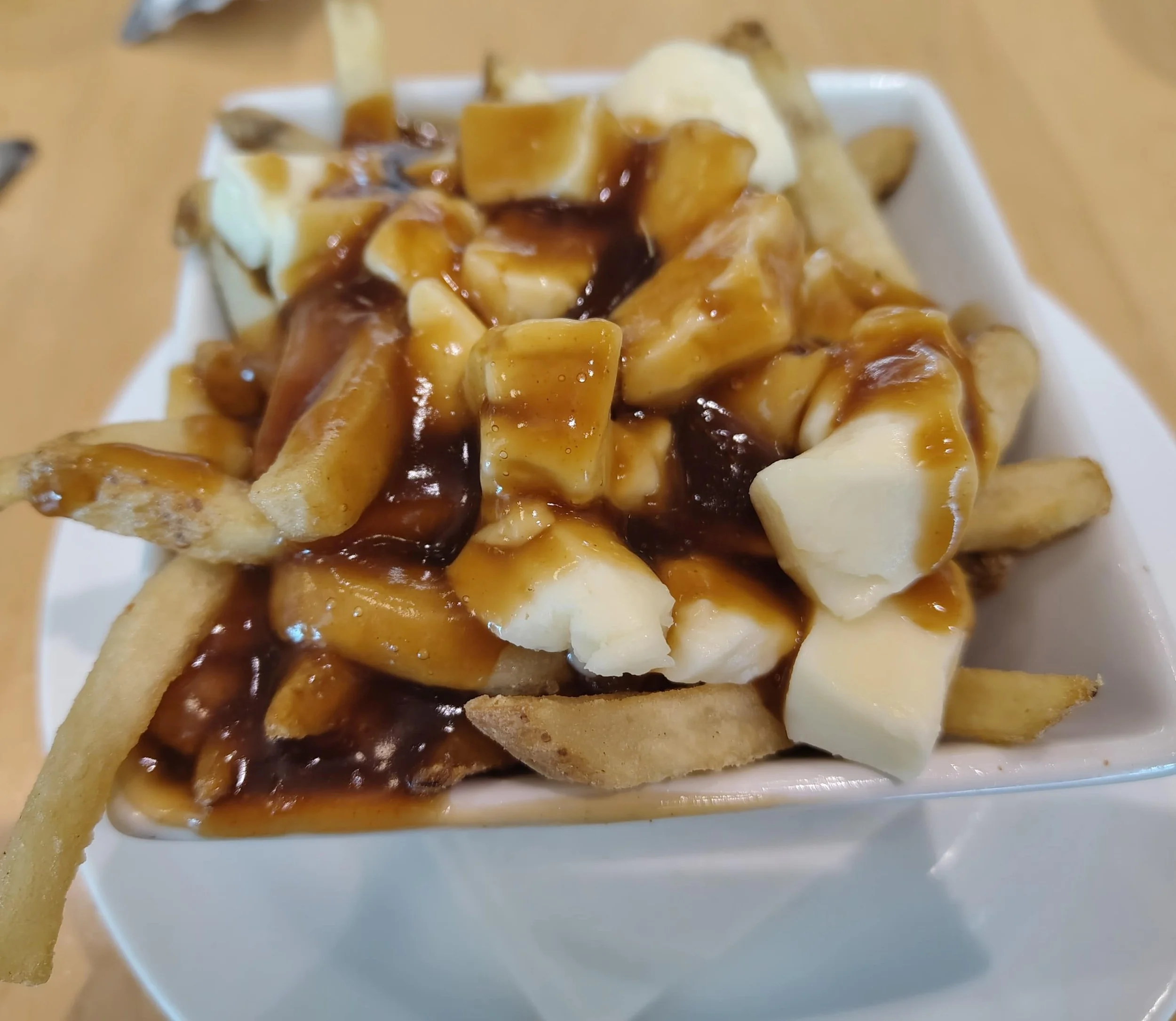 Canadian poutine – fries topped with cheese curds and gravy