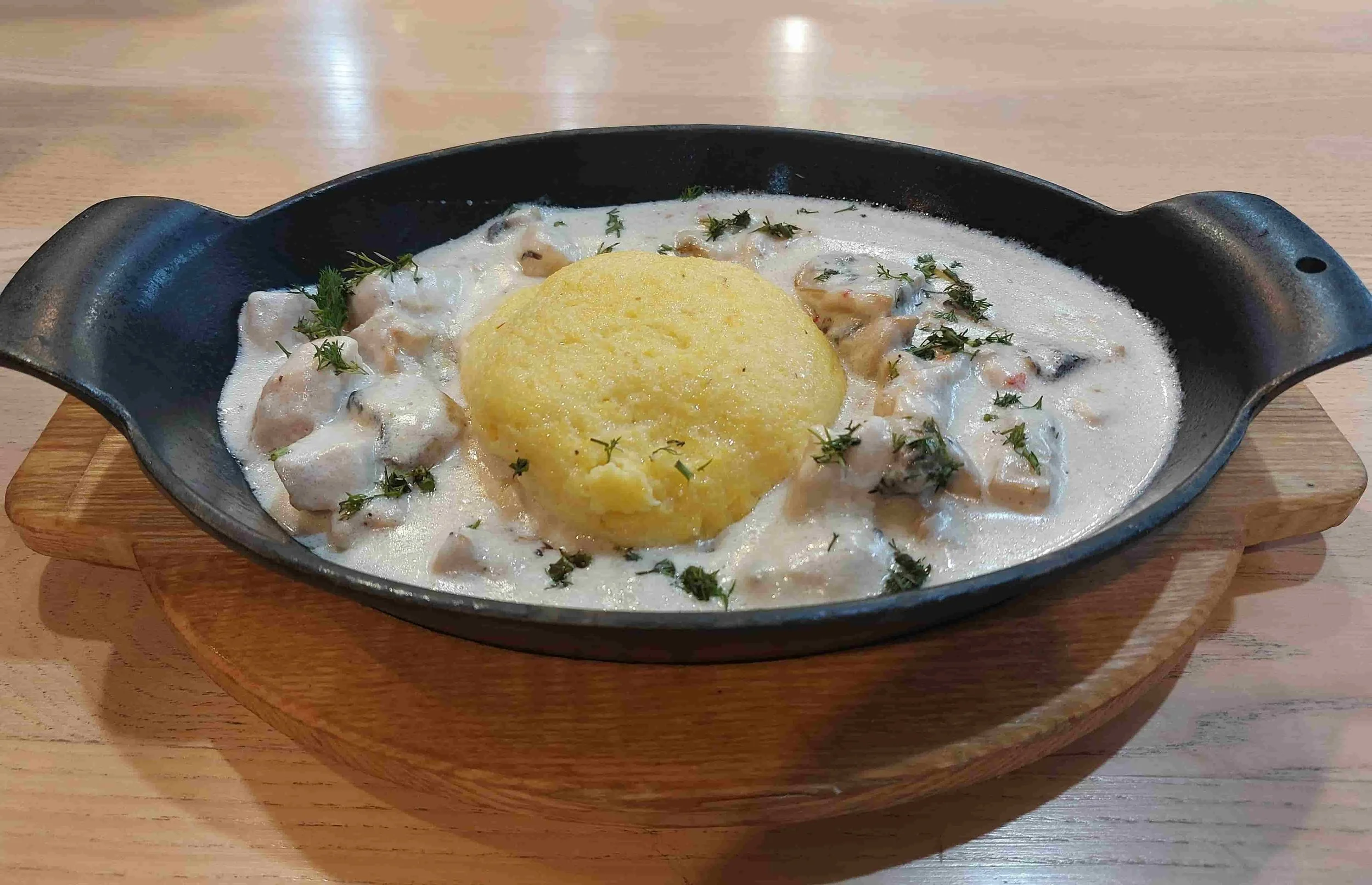 Ciulama Romanian creamy chicken stew with mushrooms & mămăligă