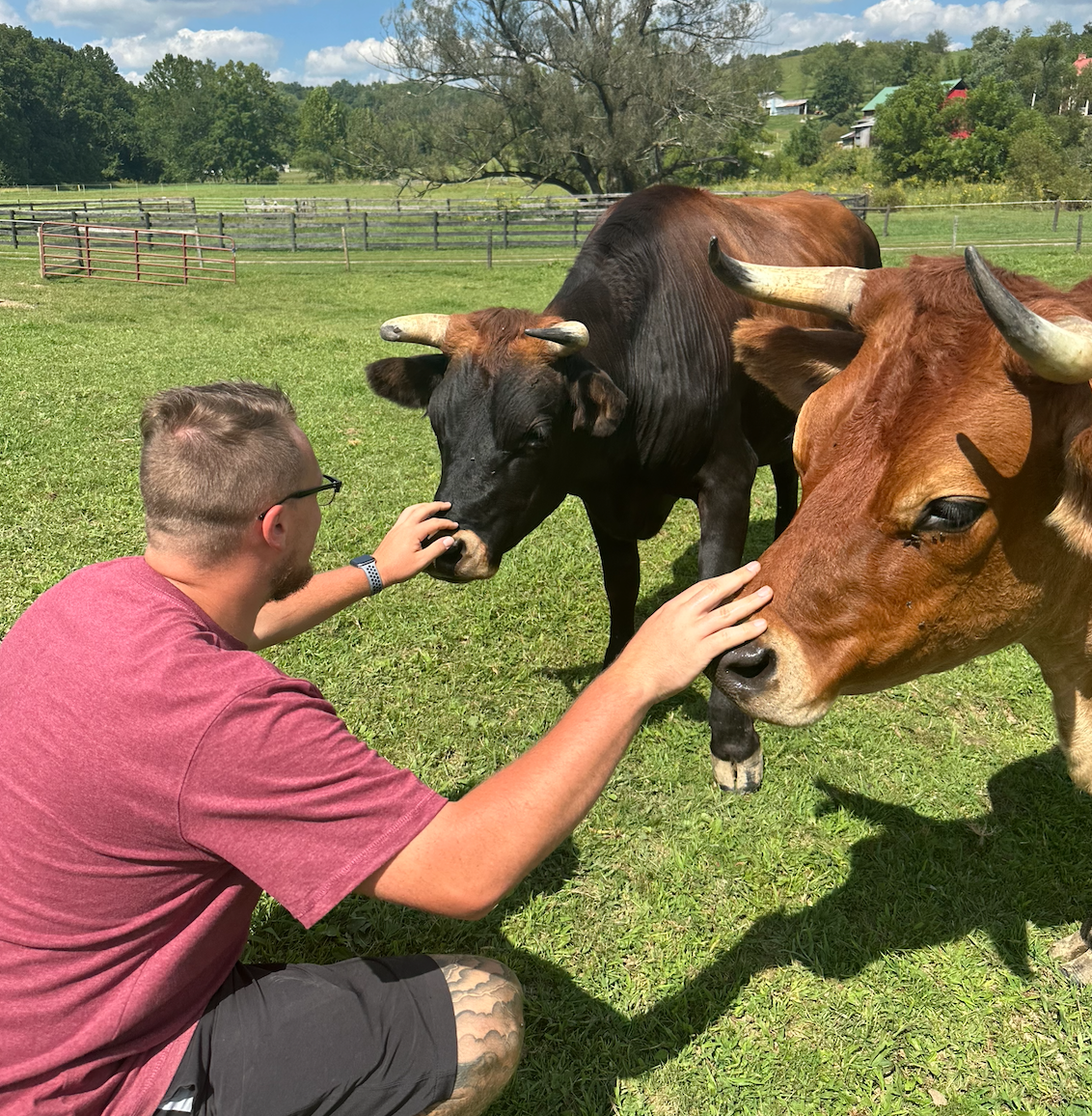 Volunteer Cole with River and Reid