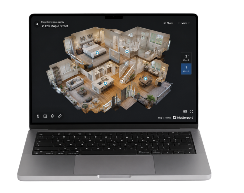 A laptop displaying a 3D floor plan of a house with multiple rooms, including a living room, kitchen, bathroom, and bedrooms, with the house's layout visible from a top-down perspective.