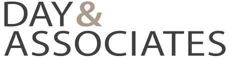 Logo for Day & Associates with black and gray text