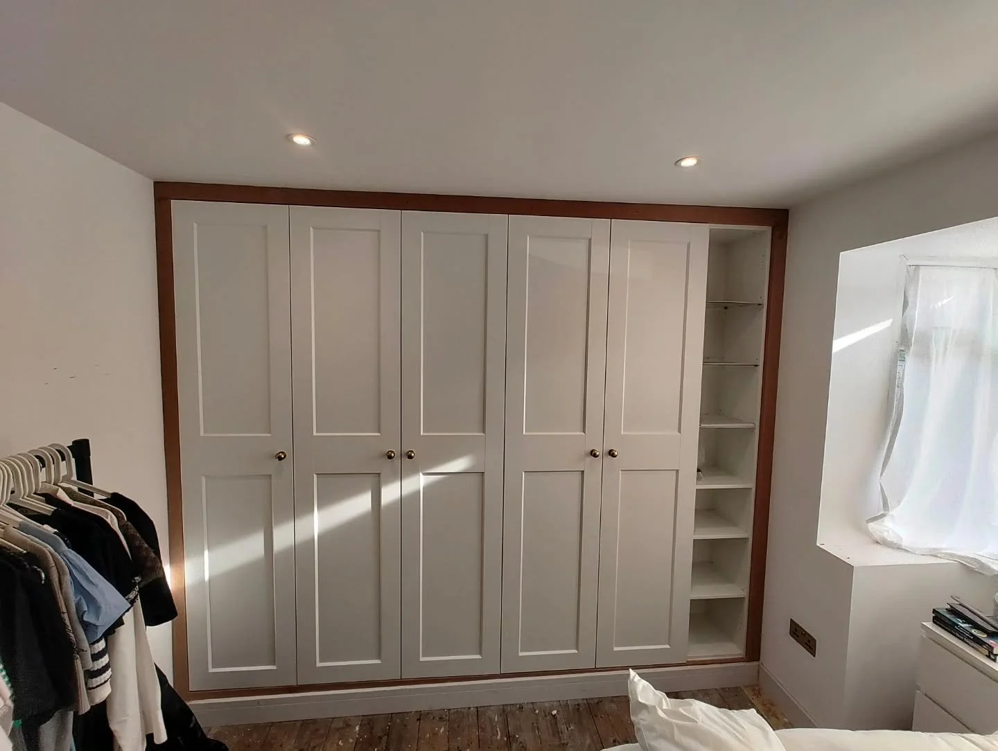 Flat-pack components, custom results. 🛠️ There&rsquo;s a big difference between "putting together furniture" and truly fitting it. By using custom infill panels and scribing to the ceiling and walls, we&rsquo;ve turned these IKEA PAX units