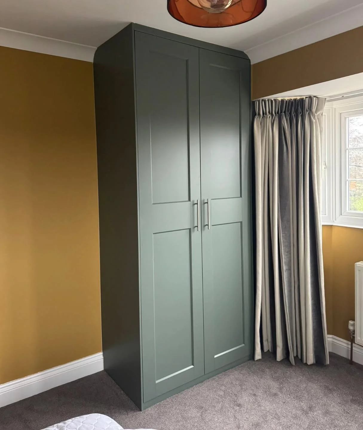 Built-in or IKEA? 🤫

We took a standard IKEA unit and gave it the full bespoke treatment for a client. By adding a custom plinth, side panels, and scribe fillers to the ceiling, we&rsquo;ve achieved that high-end, floor-to-ceiling look without the b