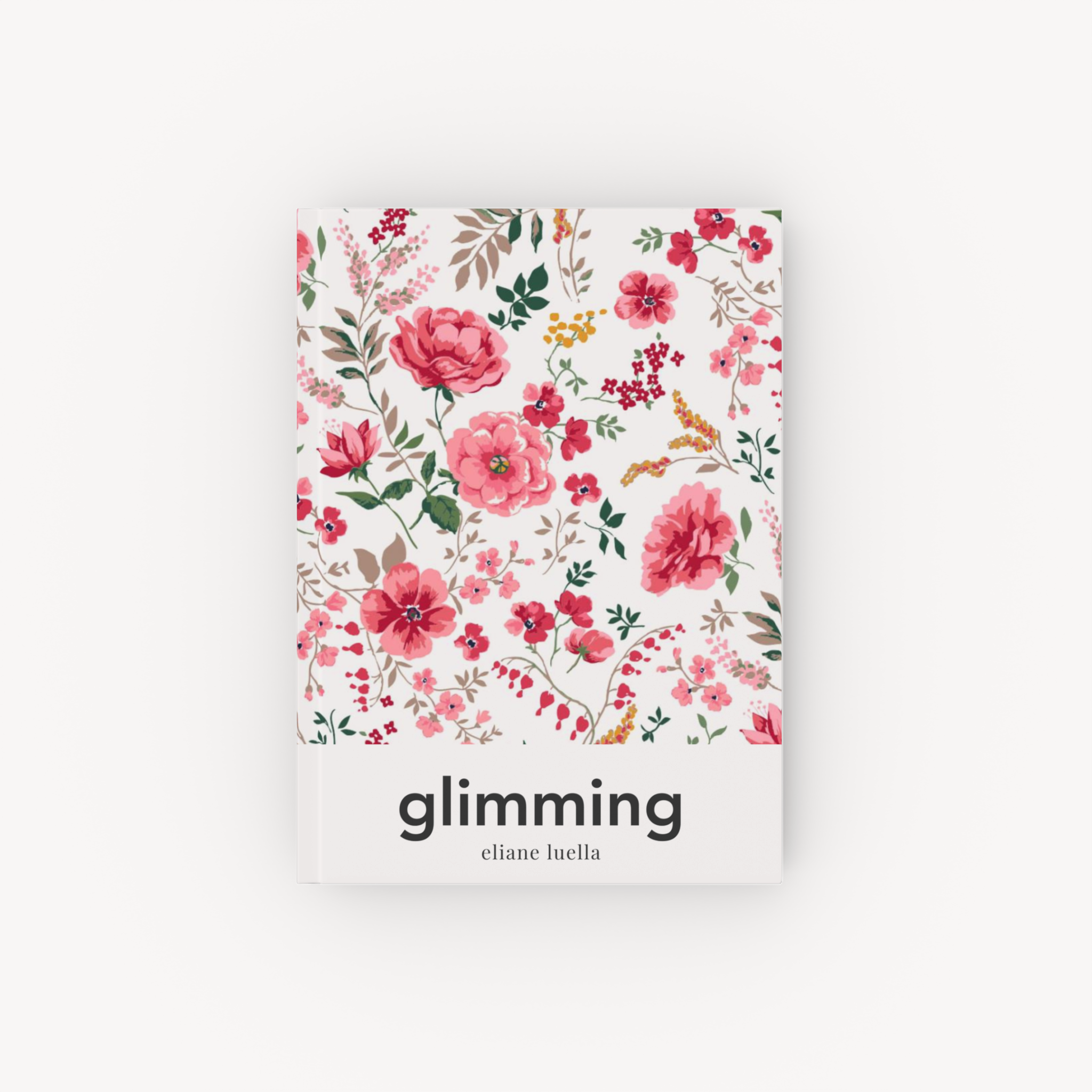 Floral hardcover notebook titled Glimming on a pale background.