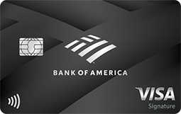 Close-up of a Bank of America Premium Rewards credit card showing the bank's logo, a Visa Signature logo, and a chip on a dark background.