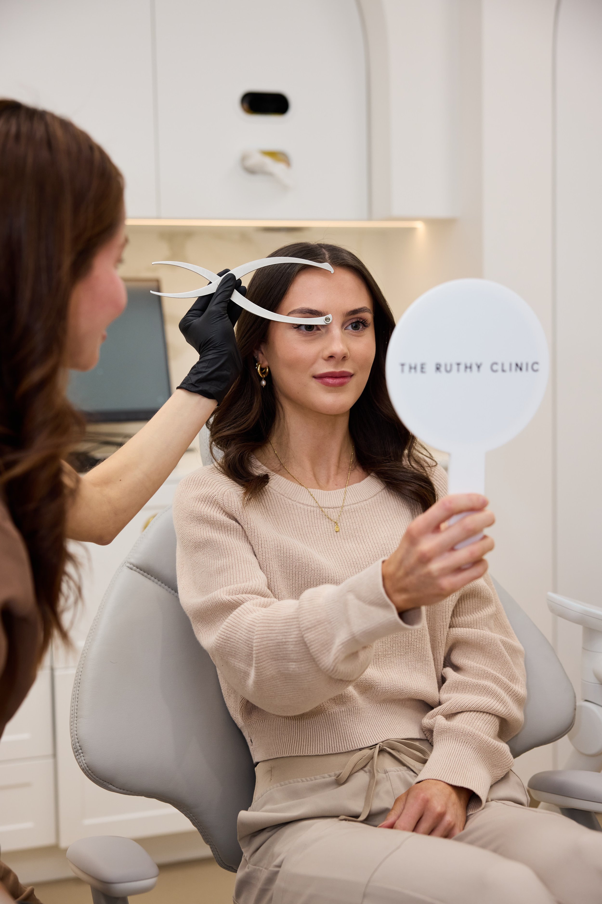 Patient receiving injectables treatment from best facial aesthetic provider in Launceston