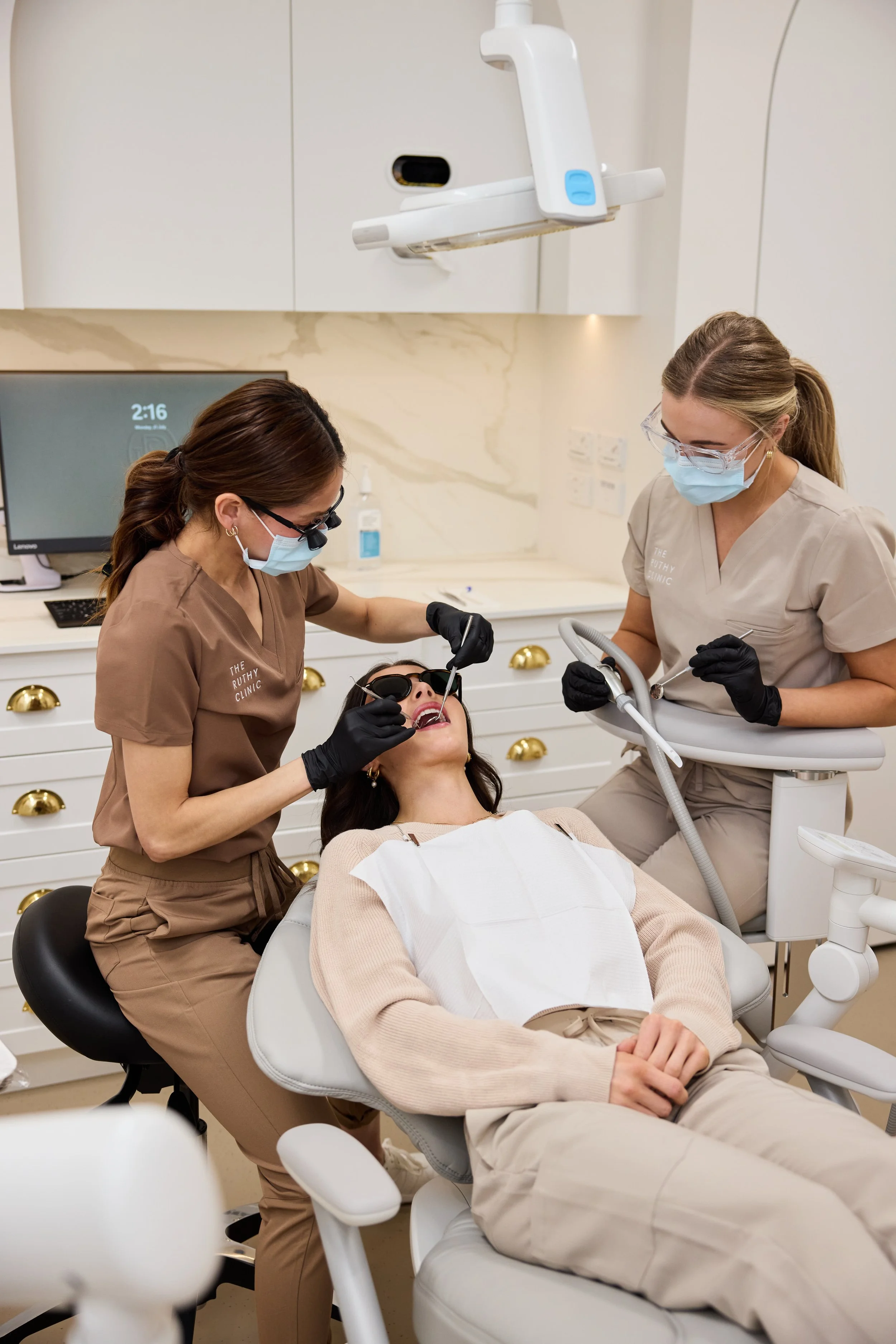Patient receiving dental treatment in modern surgery in Launceston