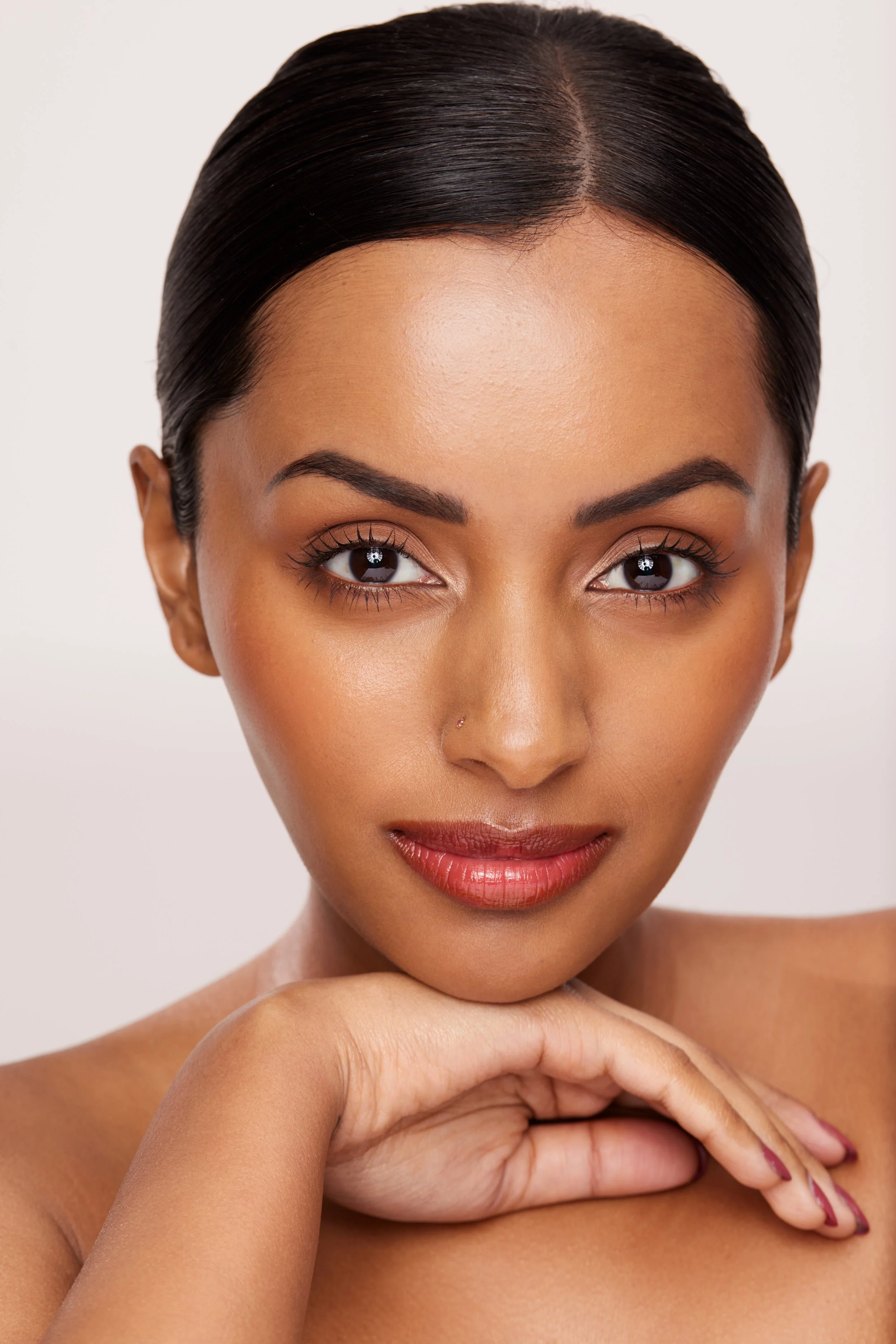 Patient of Dr Ruthy modelling her botox and filler treatment outcome in Launceston.