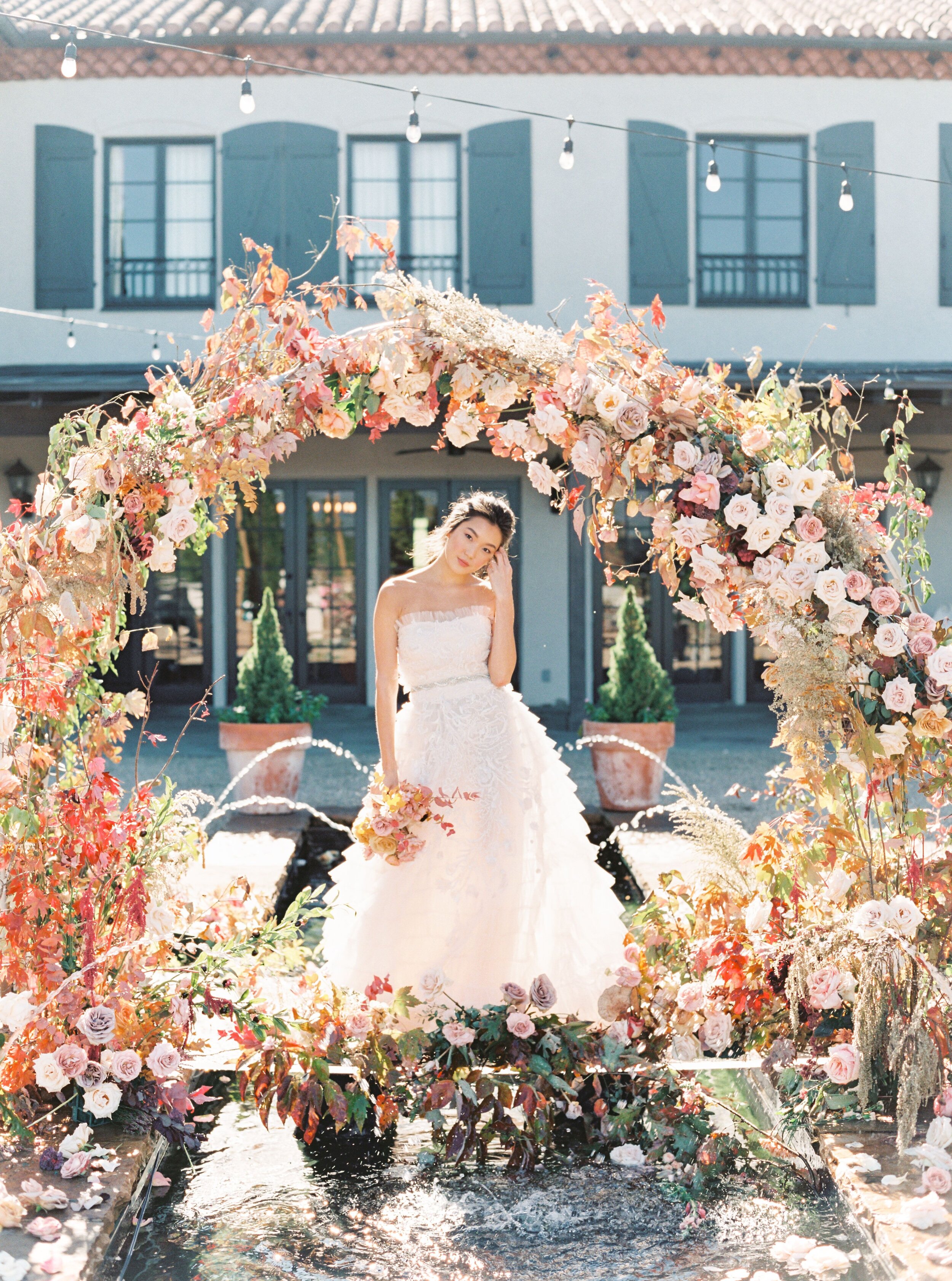 Elopement photo shoot featuring A’sha Hall in a strapless Zuhair Murad gown styled by Elite Pour La Vie at Hotel Domestique in Travelers Rest, SC. Photography by Lauren Fair, with hair and makeup by Latia Curtis Fine Art Beauty. Model Ursula Wiedmann