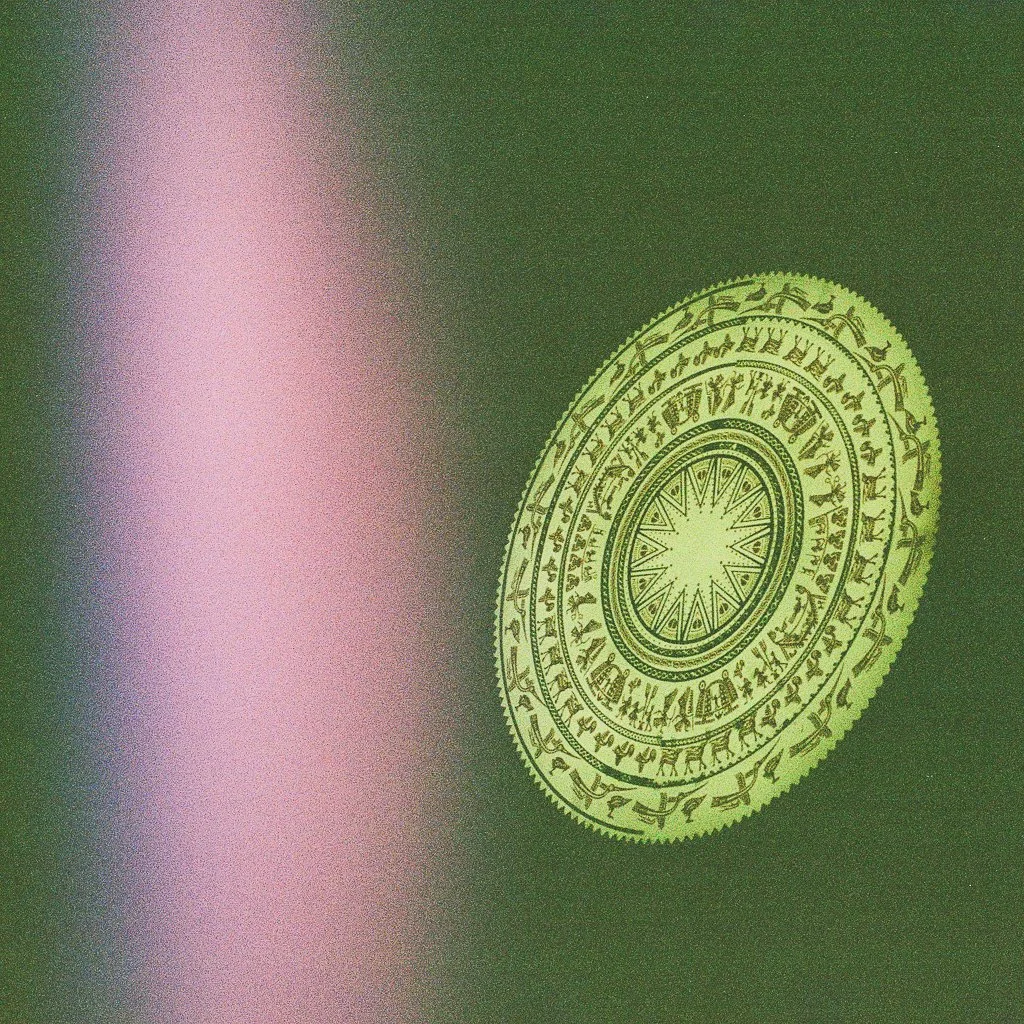 A circular, ornate design featuring concentric rings with intricate patterns and symbols, set against a dark green background with a pinkish light source on the left side.