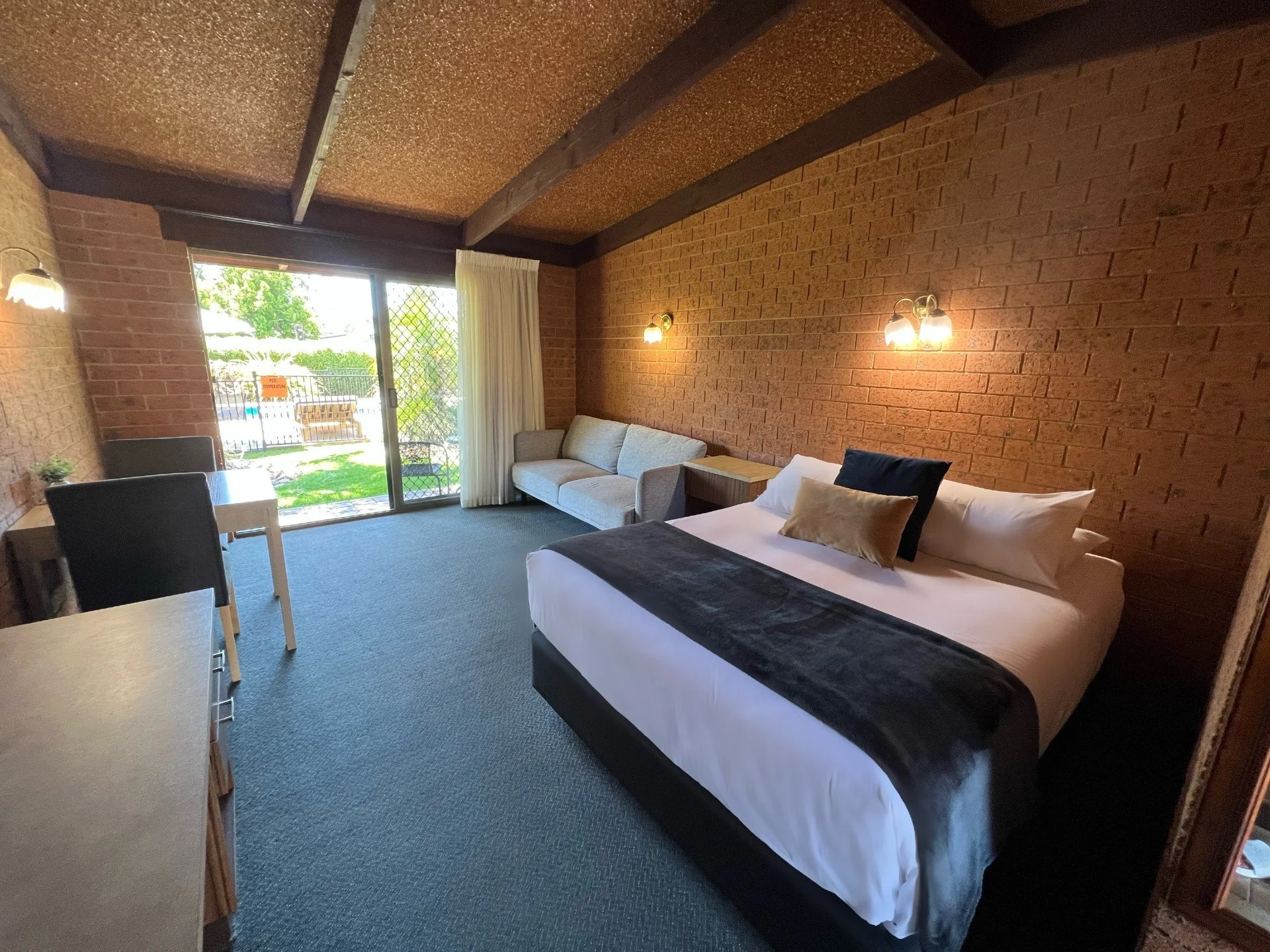 Queen room bed and room.jpg