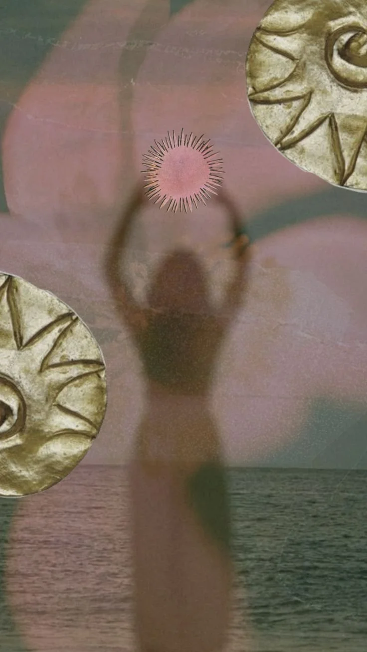 A blurry person's silhouette appears on a mirror reflecting the sunset over the ocean, with decorative sun-shaped metal ornaments around the edge of the mirror.