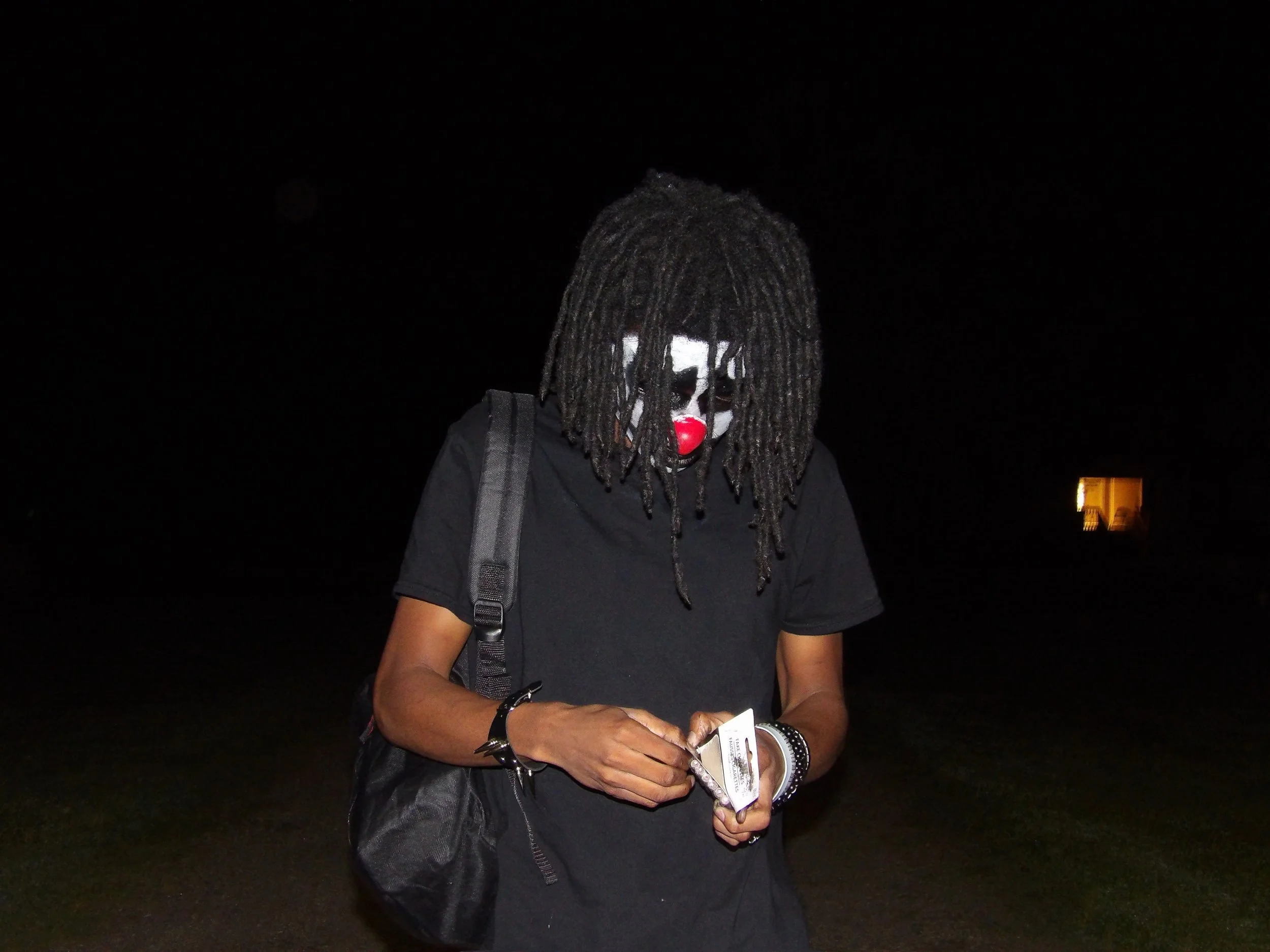 "Aeter (Jay Pittman) — official still photo in Angus Oblong–inspired clown makeup for the Clown album. Wearing a black outfit that reflects an emo, underground aesthetic, Aeter’s visual style blends surreal horror and theatrical melancholy. This imag