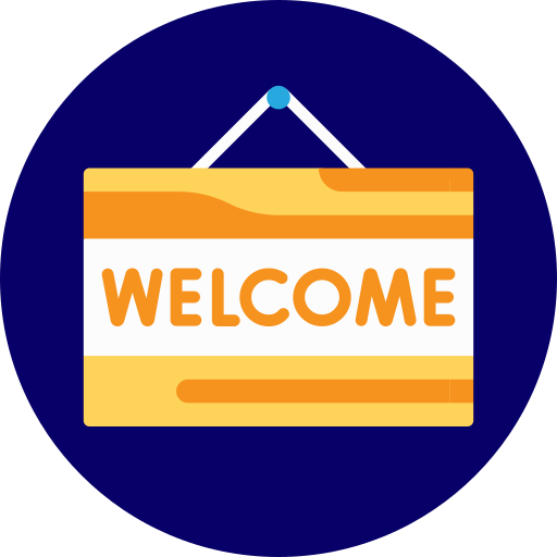 A welcoming sign with the word "WELCOME" on it, hanging on a dark background.